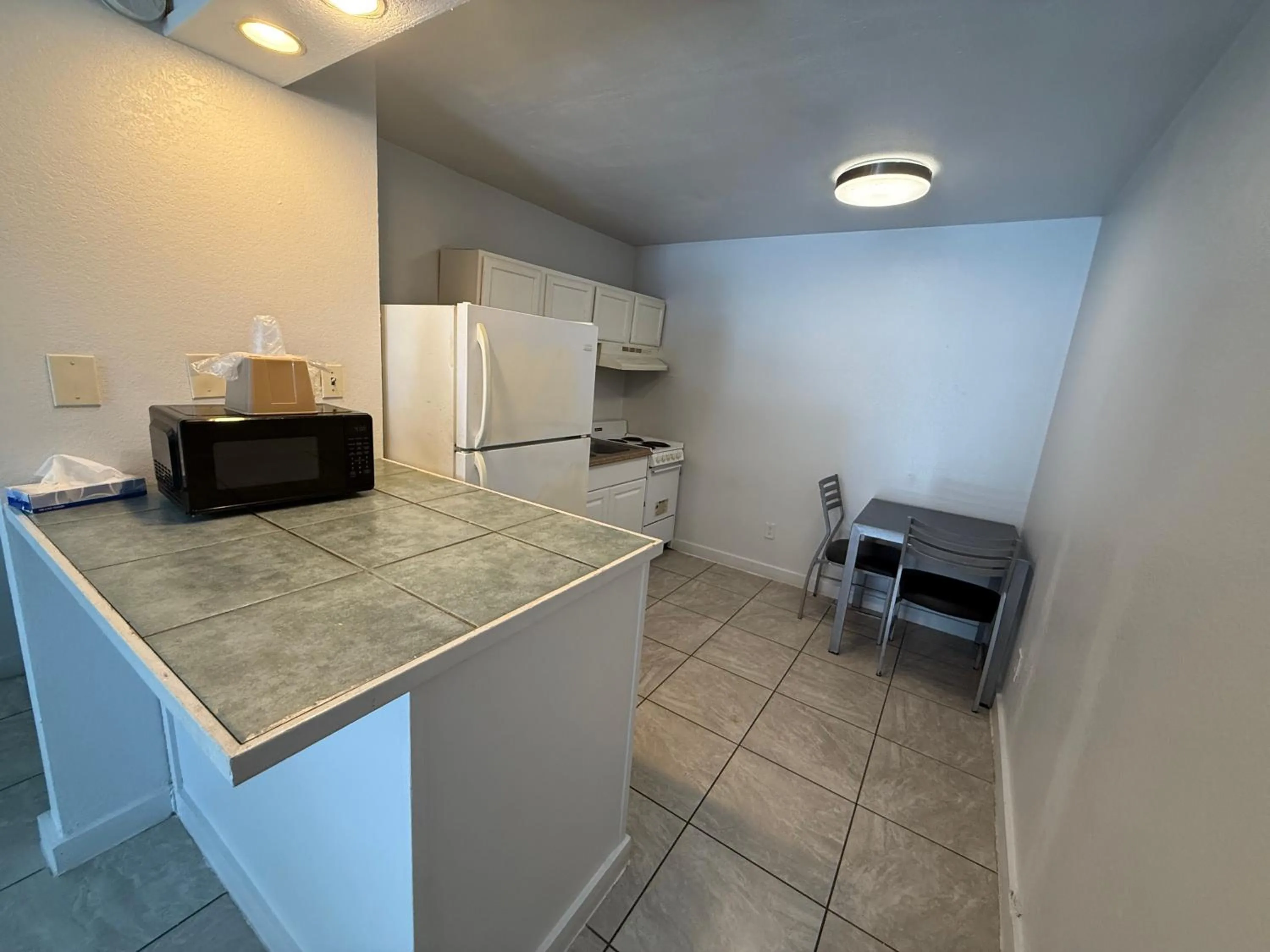 Kitchen or kitchenette in Blue Marlin Motel