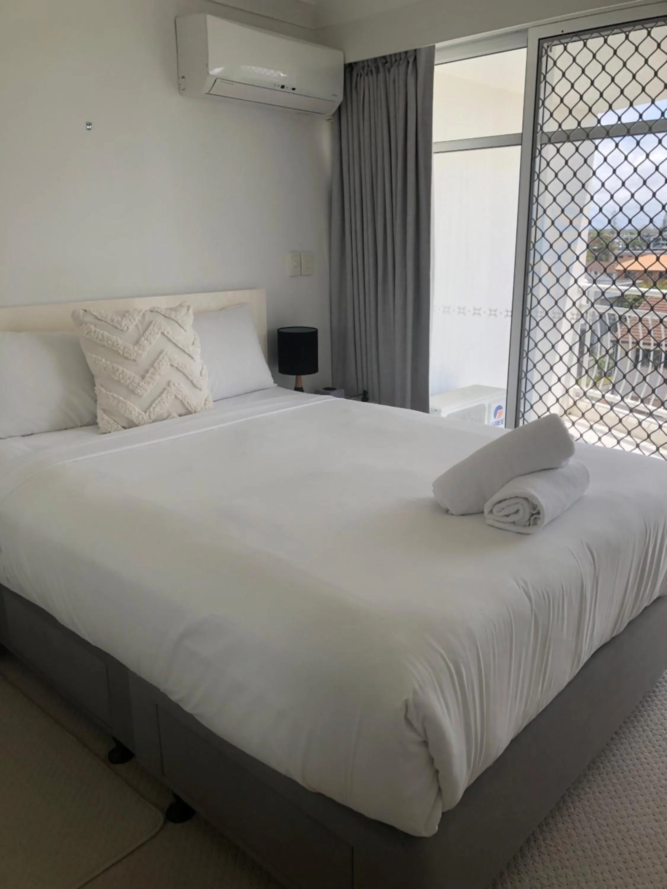 Bed in The Atrium Resort