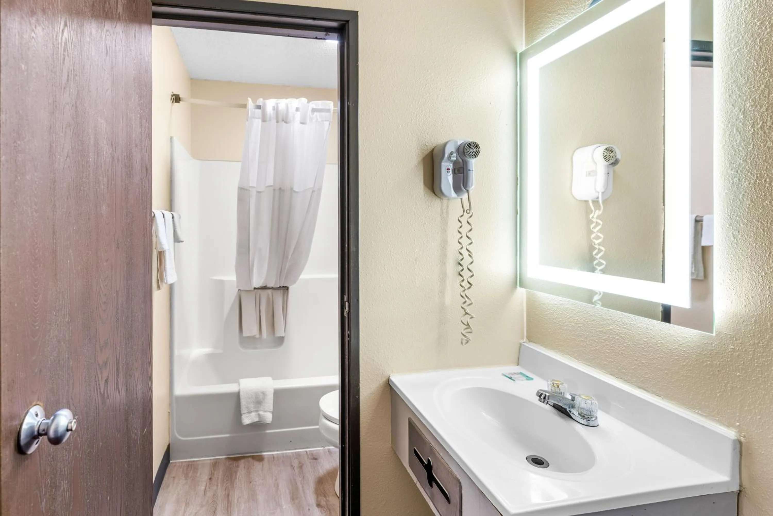 Shower in Americas Best Value Inn Decatur