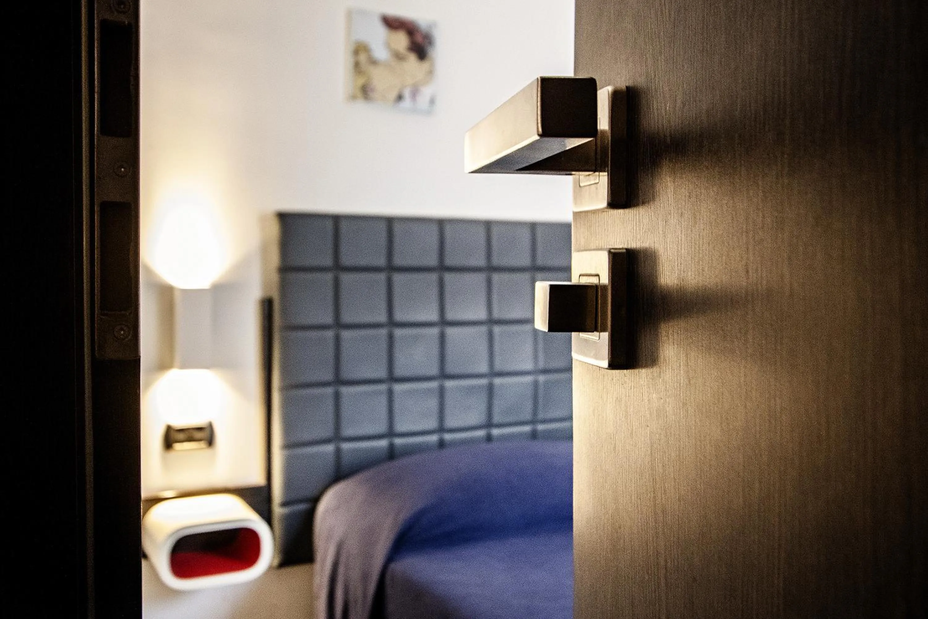 Decorative detail, Bed in Old Kitchen Vatican Suites