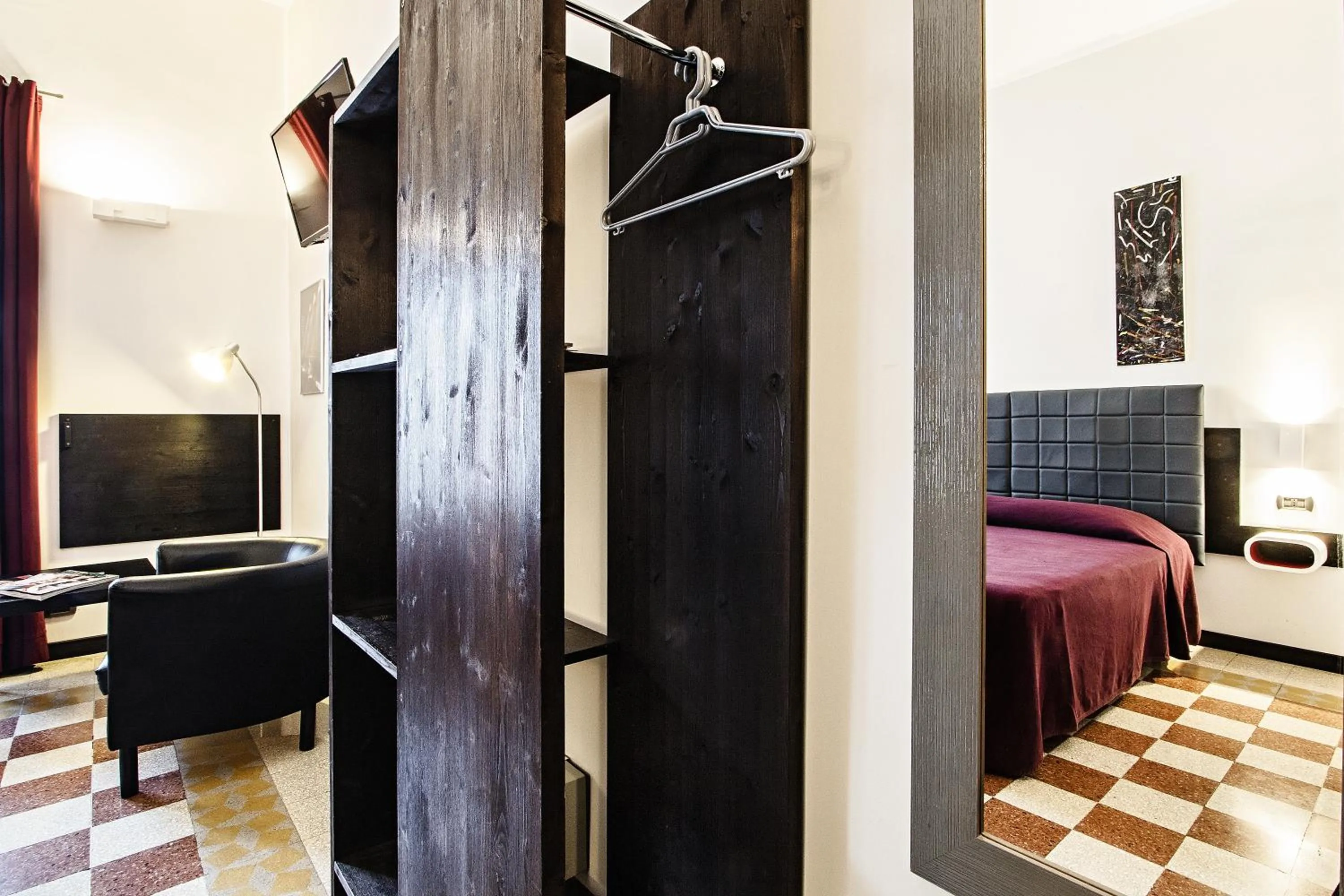 Decorative detail, Bed in Old Kitchen Vatican Suites