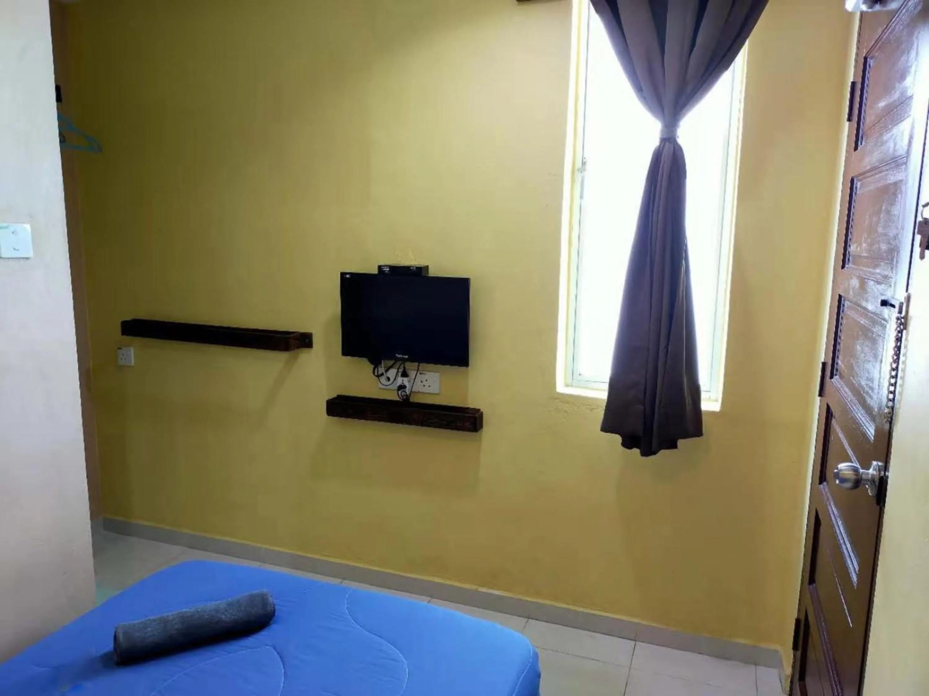 Photo of the whole room in CSH Motel Kuala Perlis Jetty