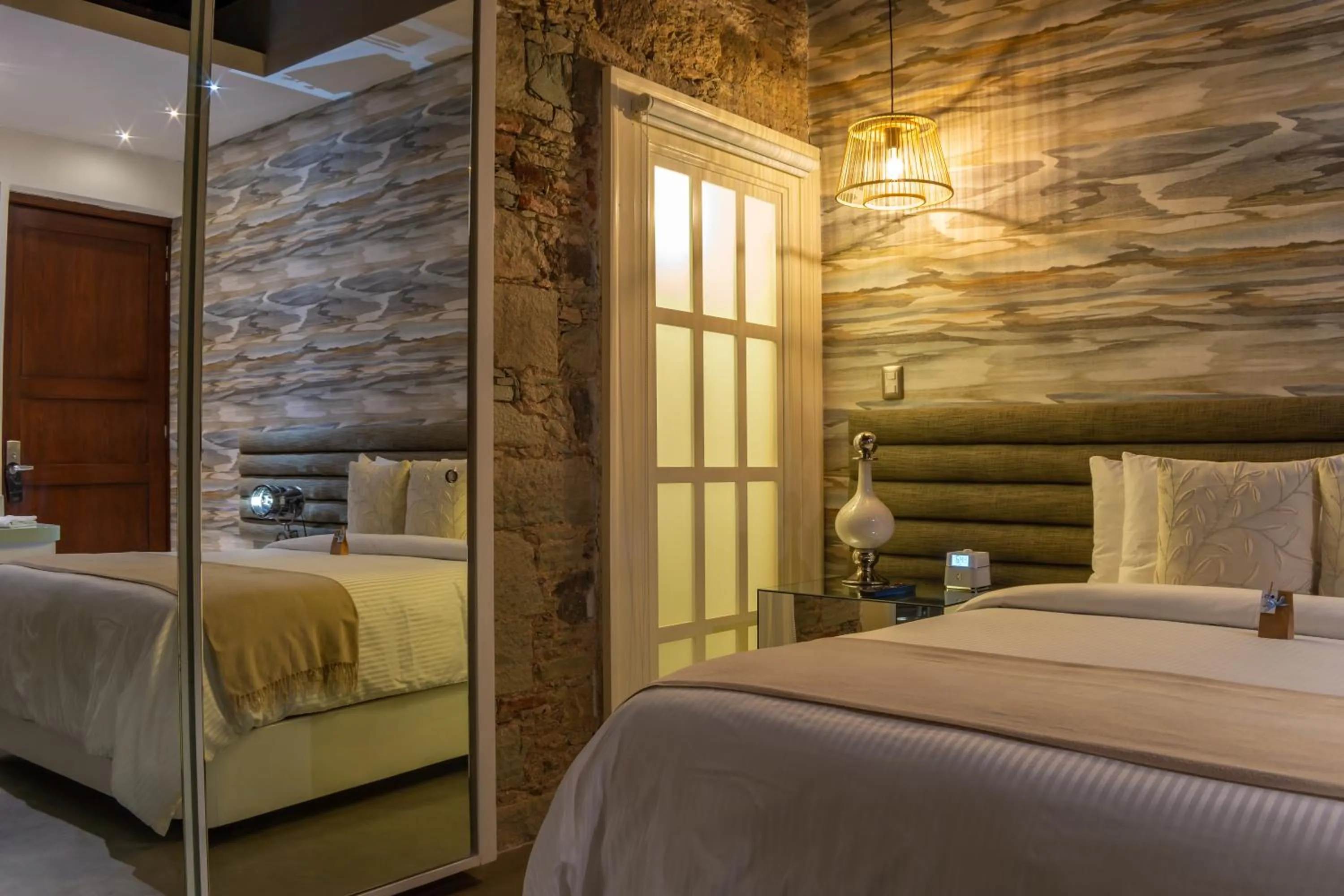 Bed in 1850 Hotel Boutique