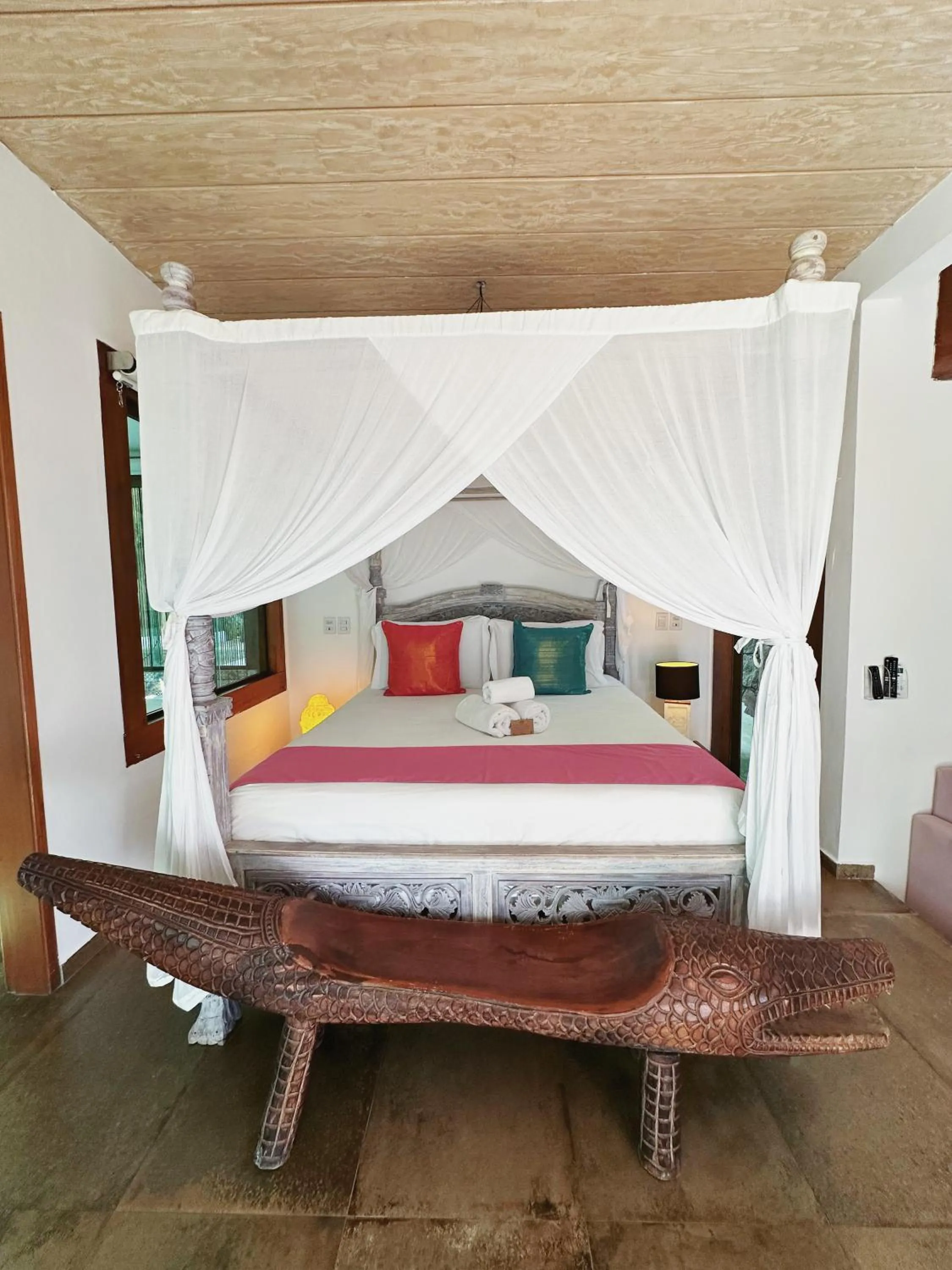 Bed in Hotel Vila Kebaya