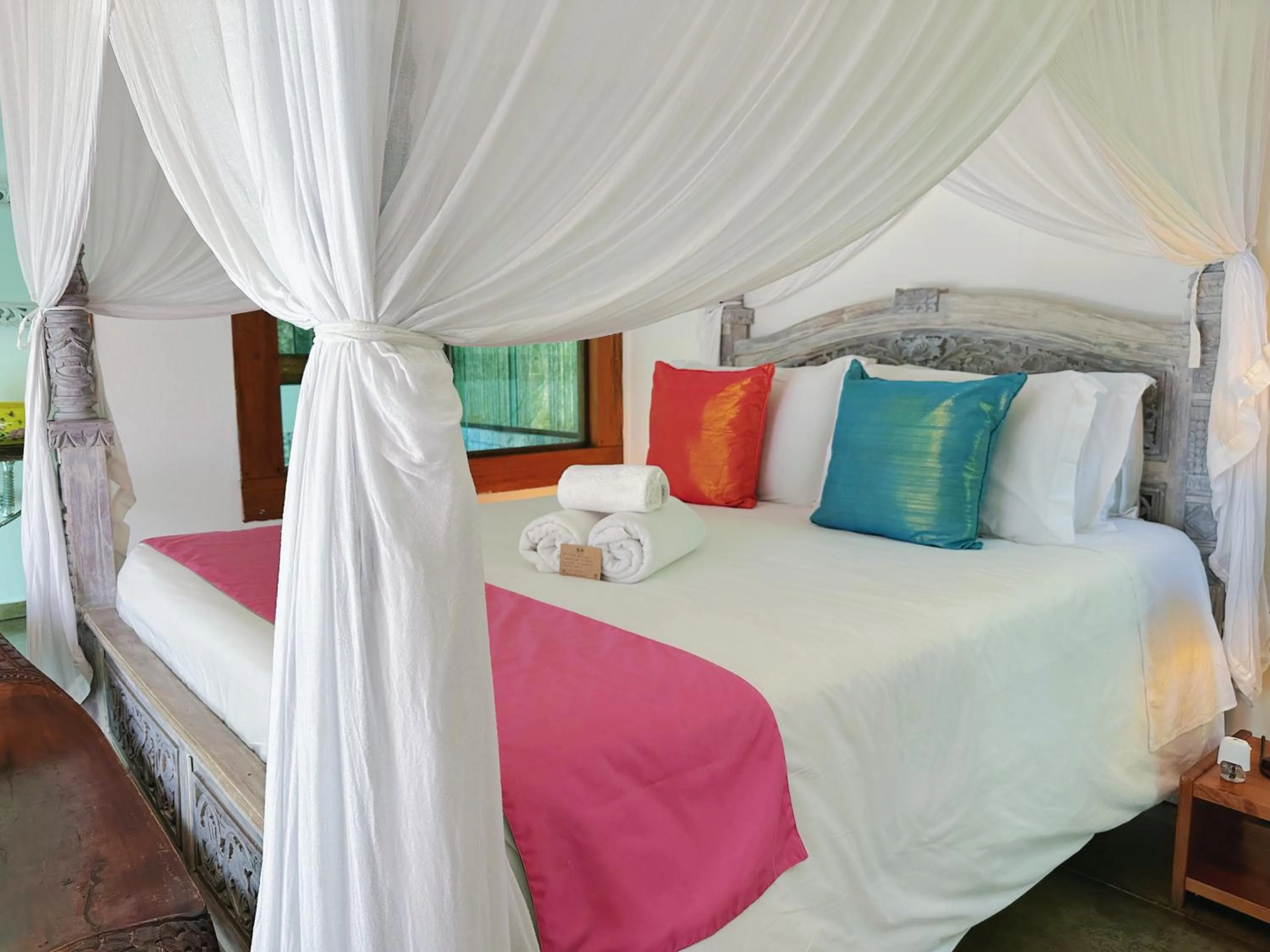 Bed in Hotel Vila Kebaya