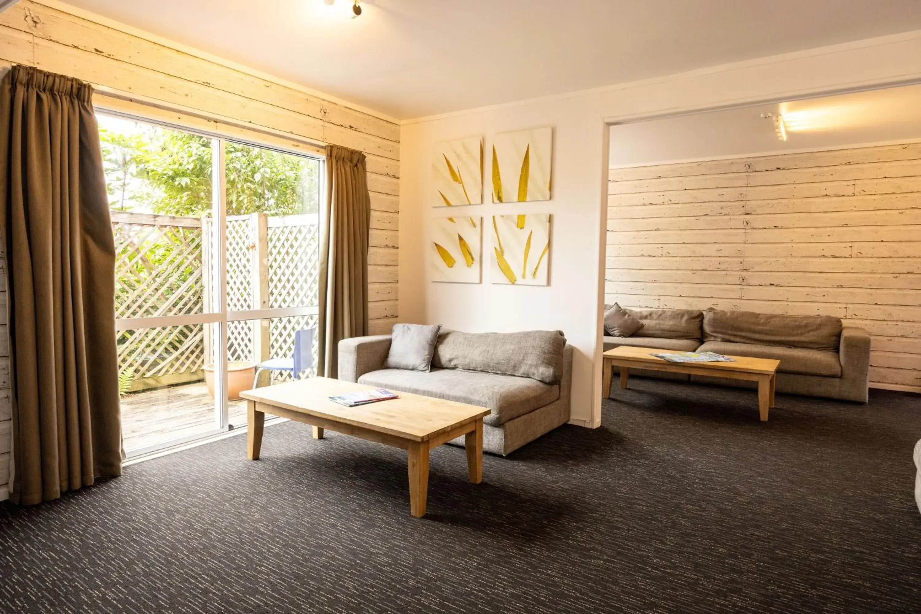 Communal lounge/ TV room, Bed in Haka House Taupo Communal lounge/ TV room, Bed in Haka House Taupo