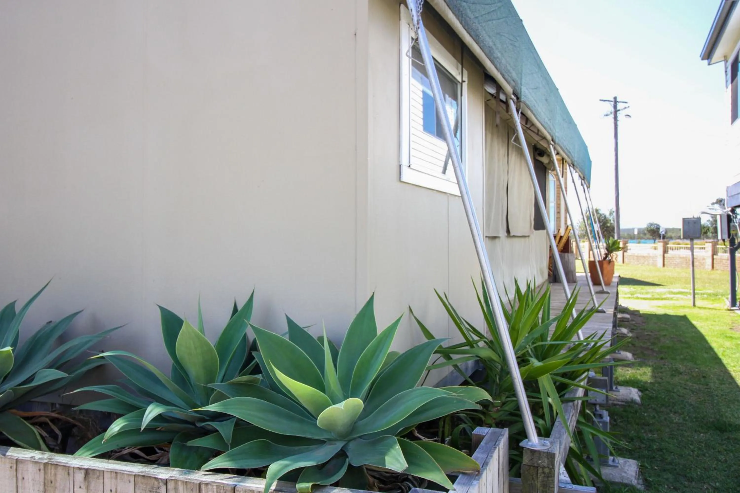 Facade/entrance in South Coast Retreat