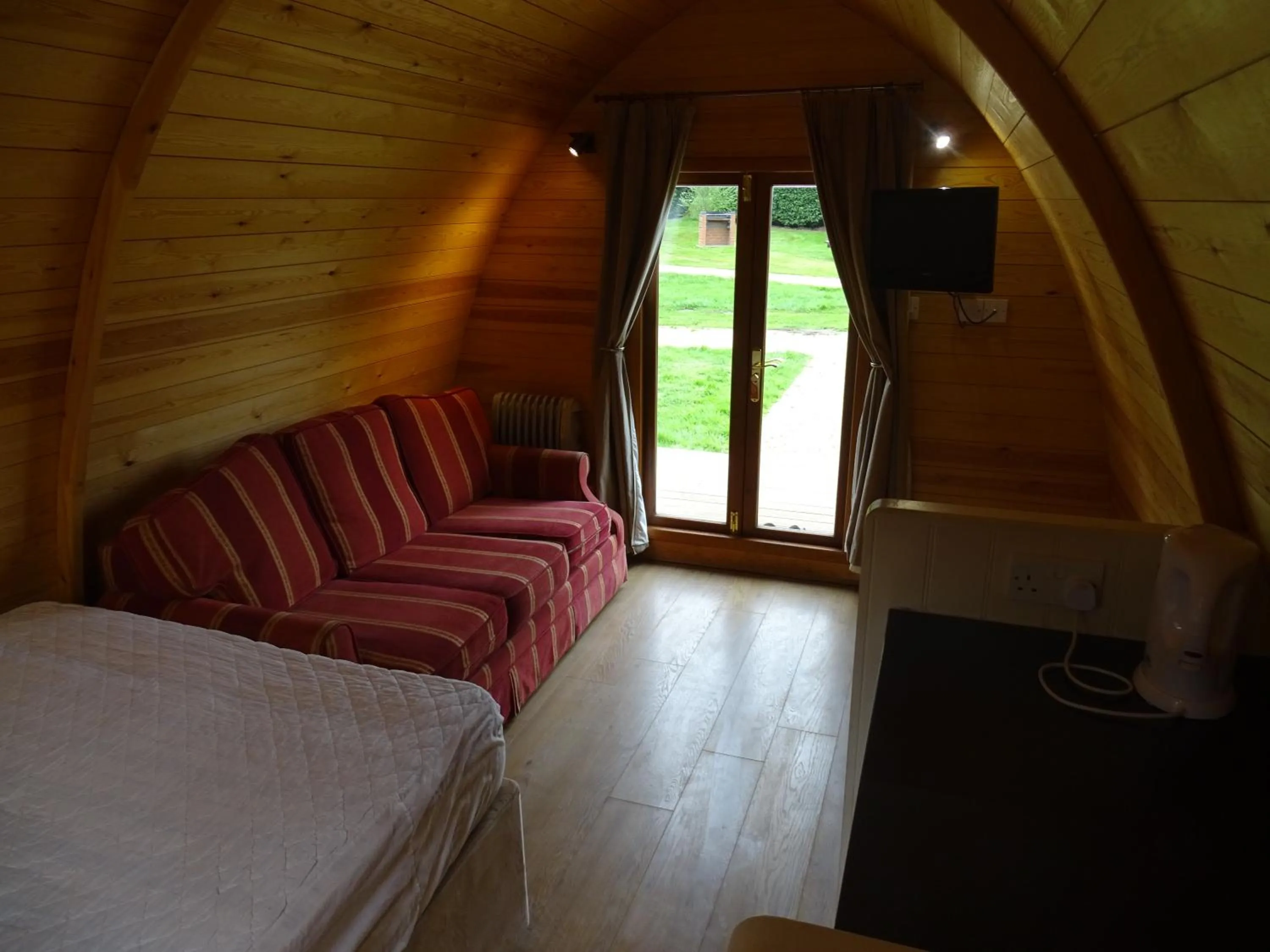 Living room, Bed in King's Lynn Caravan & Camping Park