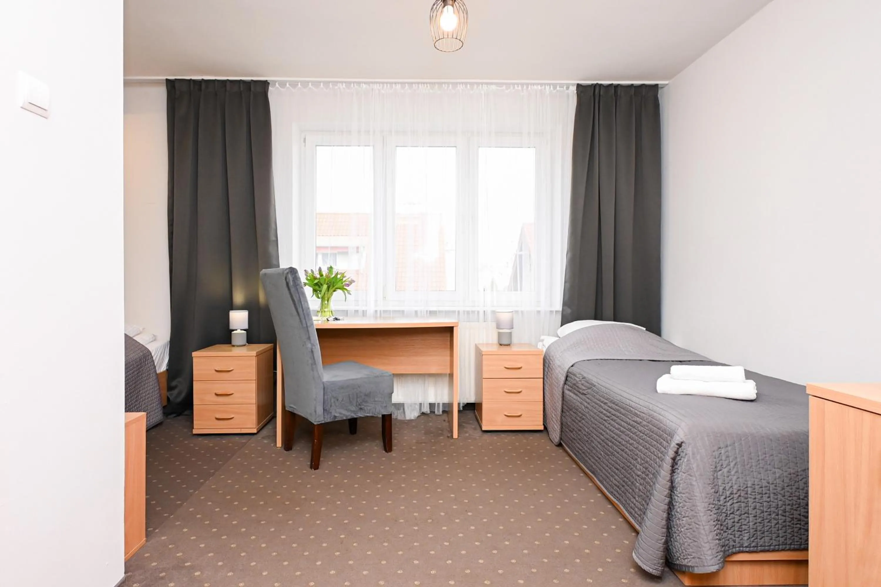 Bed in Hotel Dom Polonii