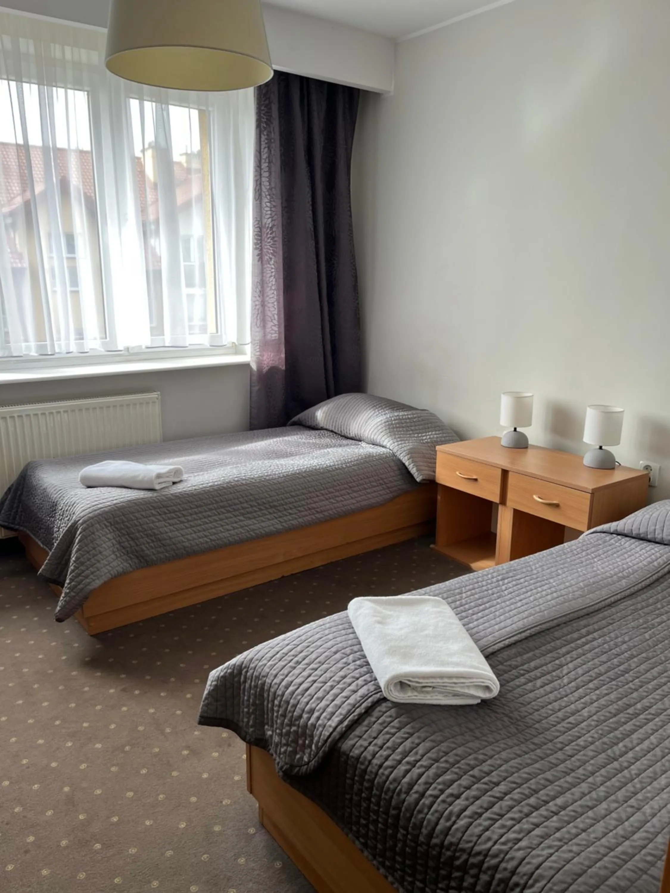 Bed in Hotel Dom Polonii