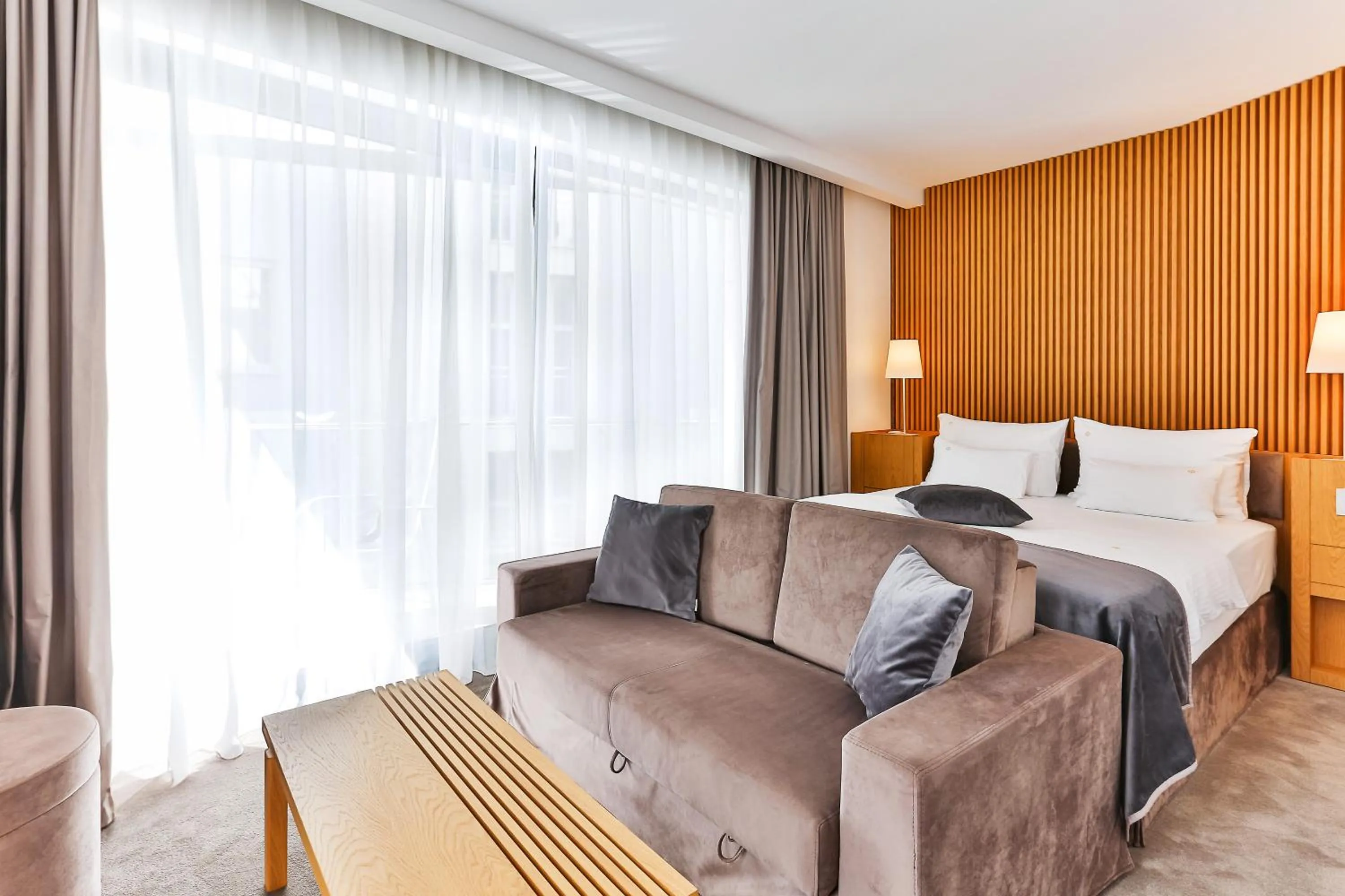 Seating area, Bed in Hotel Fagus by Aycon