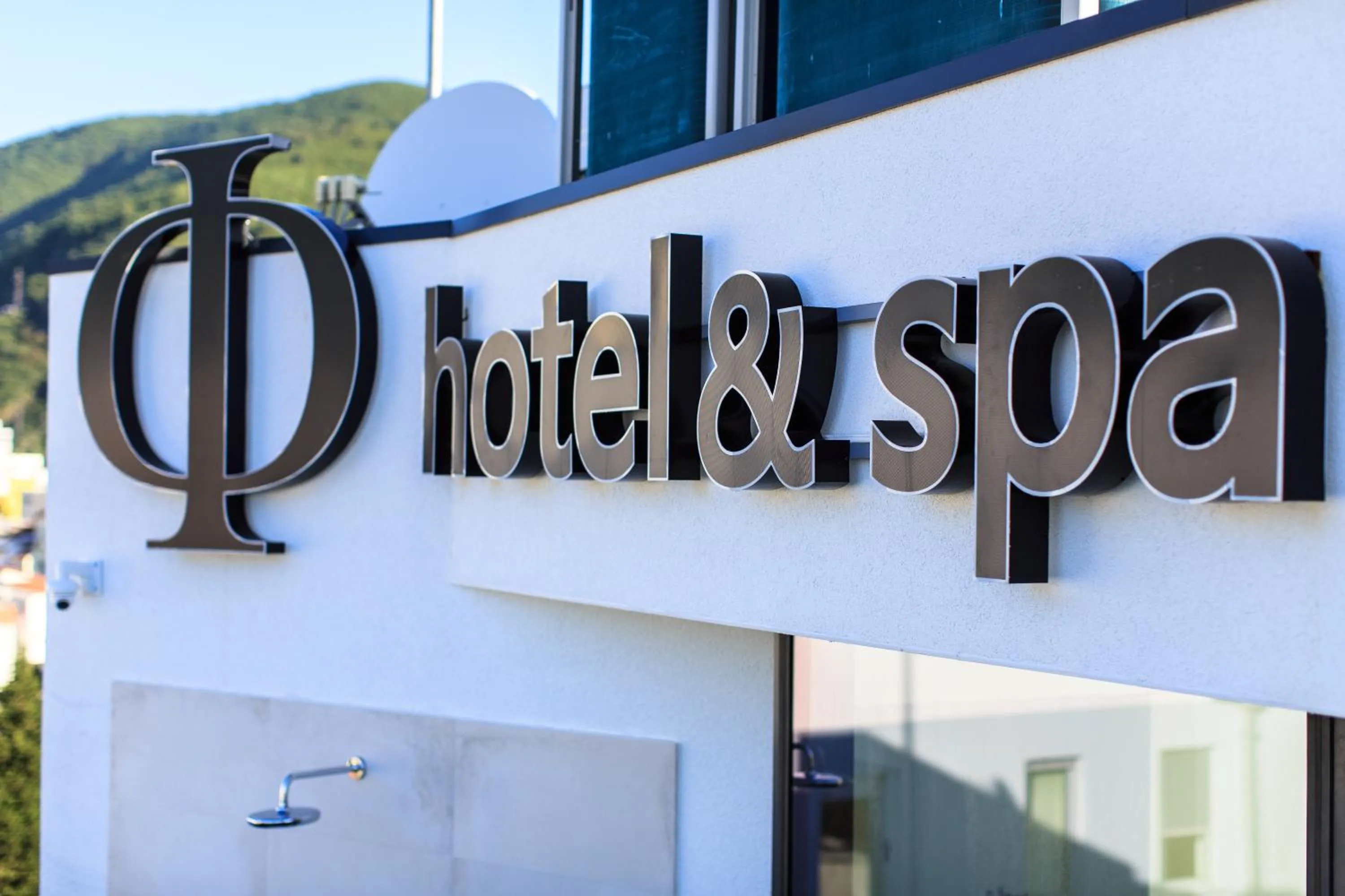 Property logo or sign in Hotel Fagus by Aycon