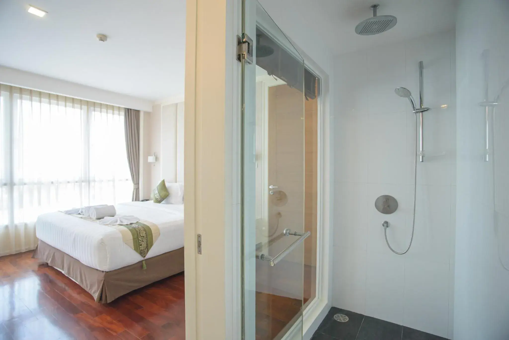 Shower, Bed in GM Serviced Apartment Shower, Bed in GM Serviced Apartment