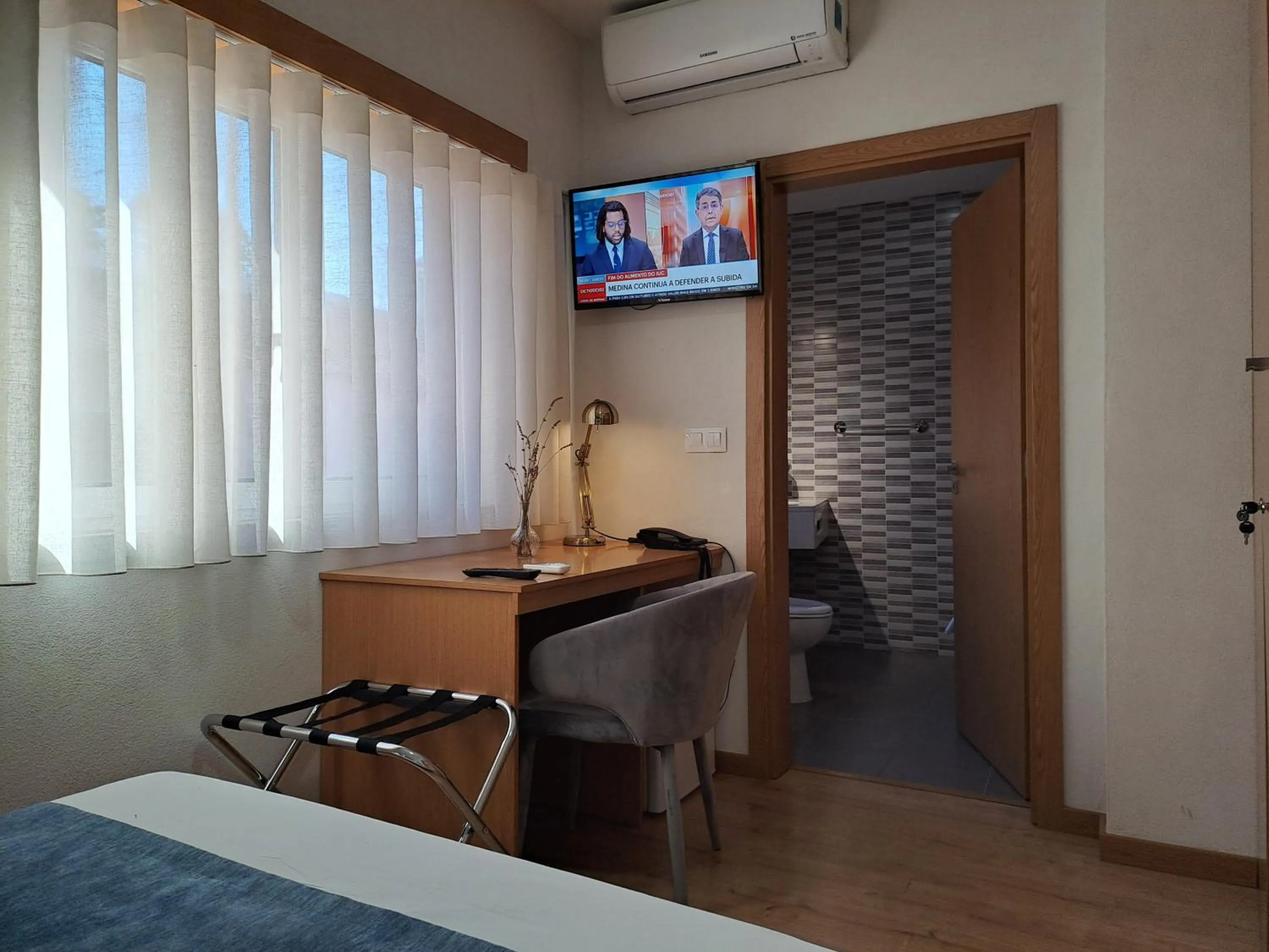 Seating area, Bed in Hotel SQUARE