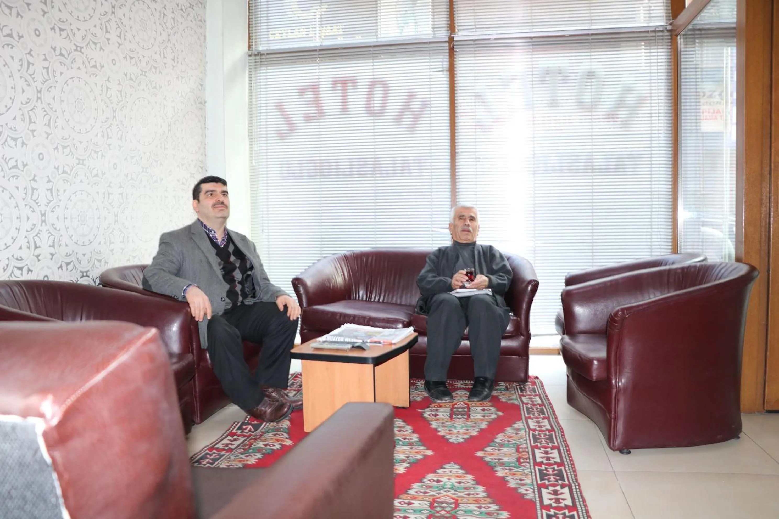 Communal lounge/ TV room in Talaslioglu Hotel