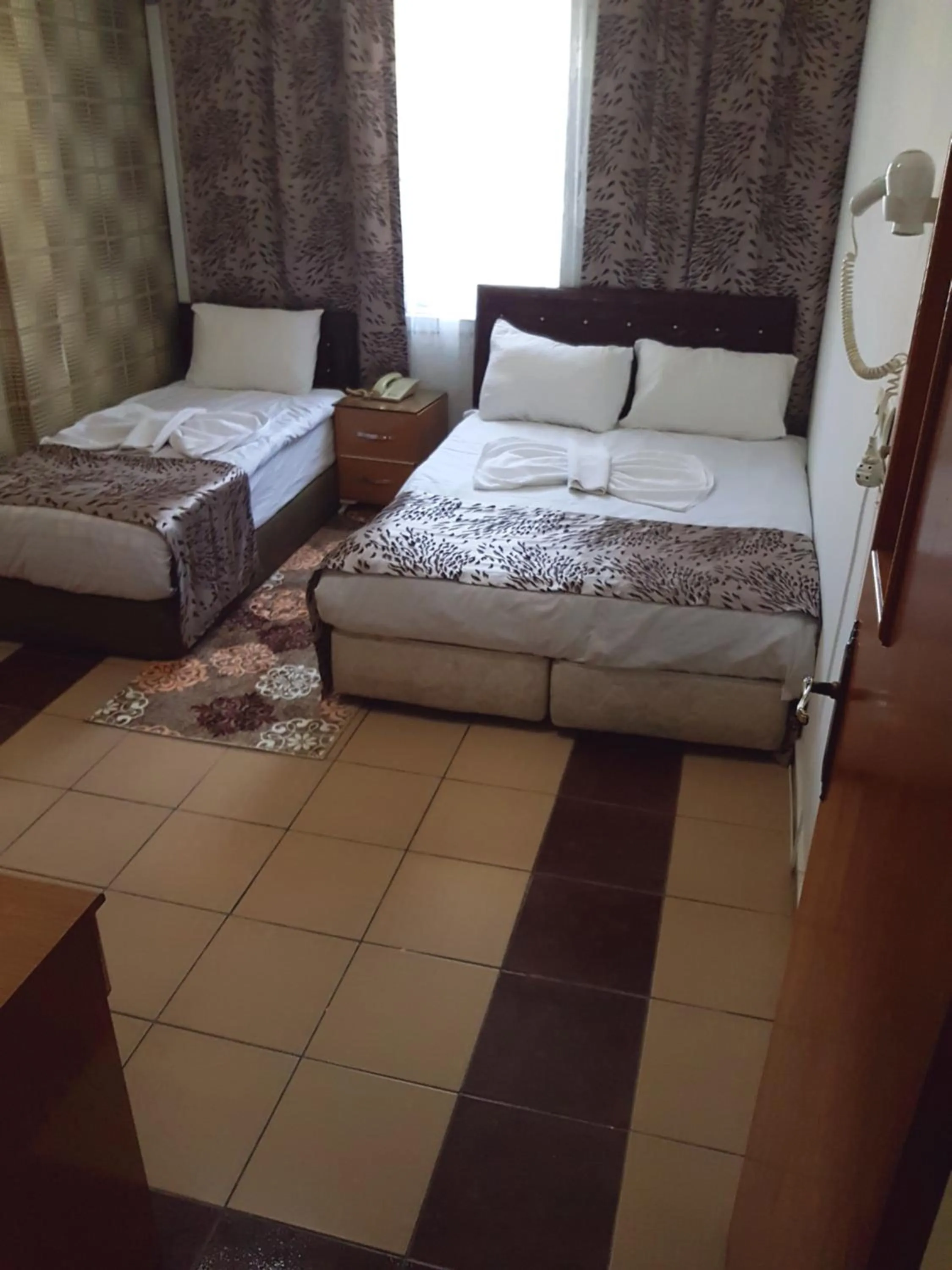 Photo of the whole room, Bed in Talaslioglu Hotel