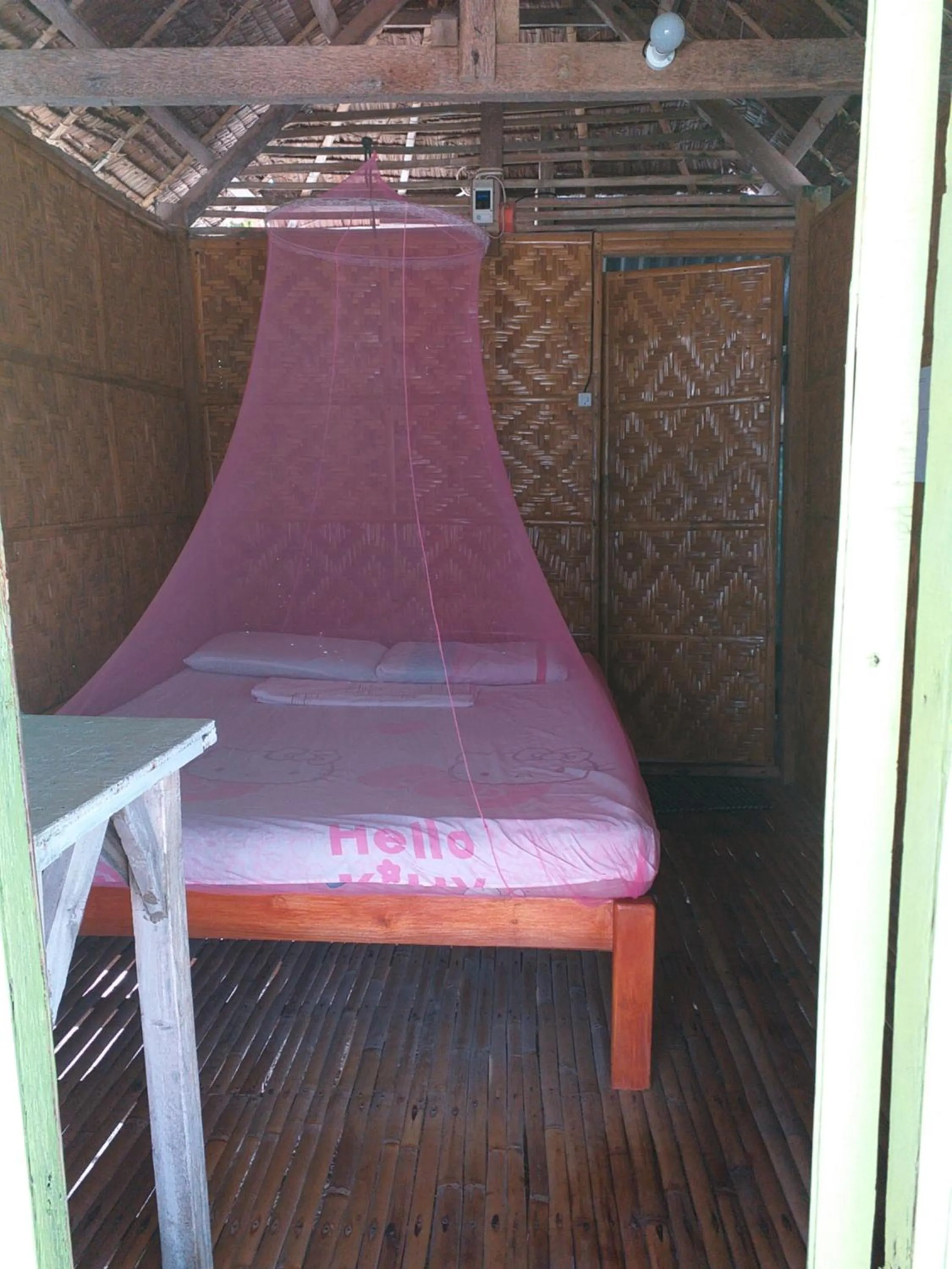 Bed in Junior & Nemesia's Cottages