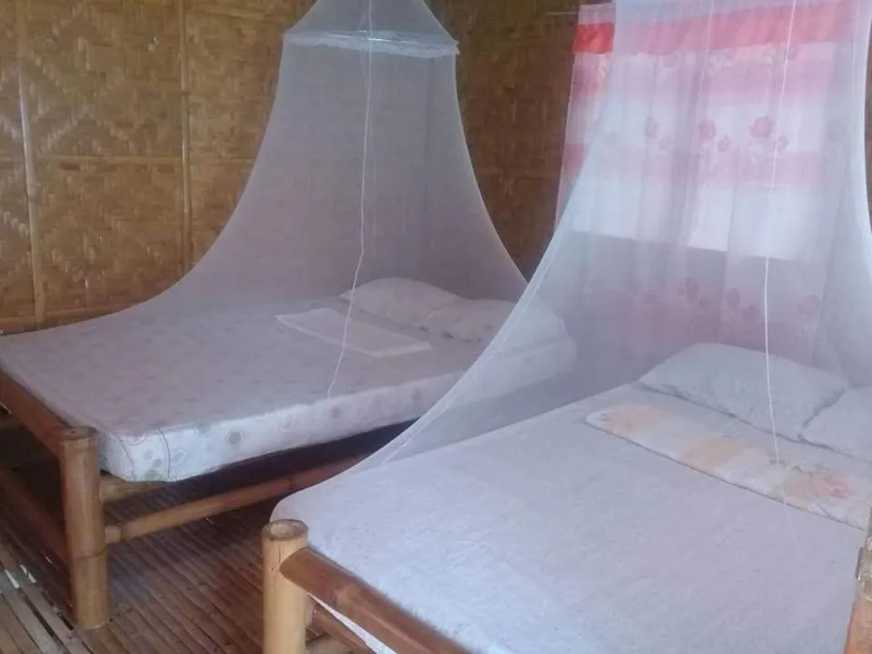 Bed in Junior & Nemesia's Cottages