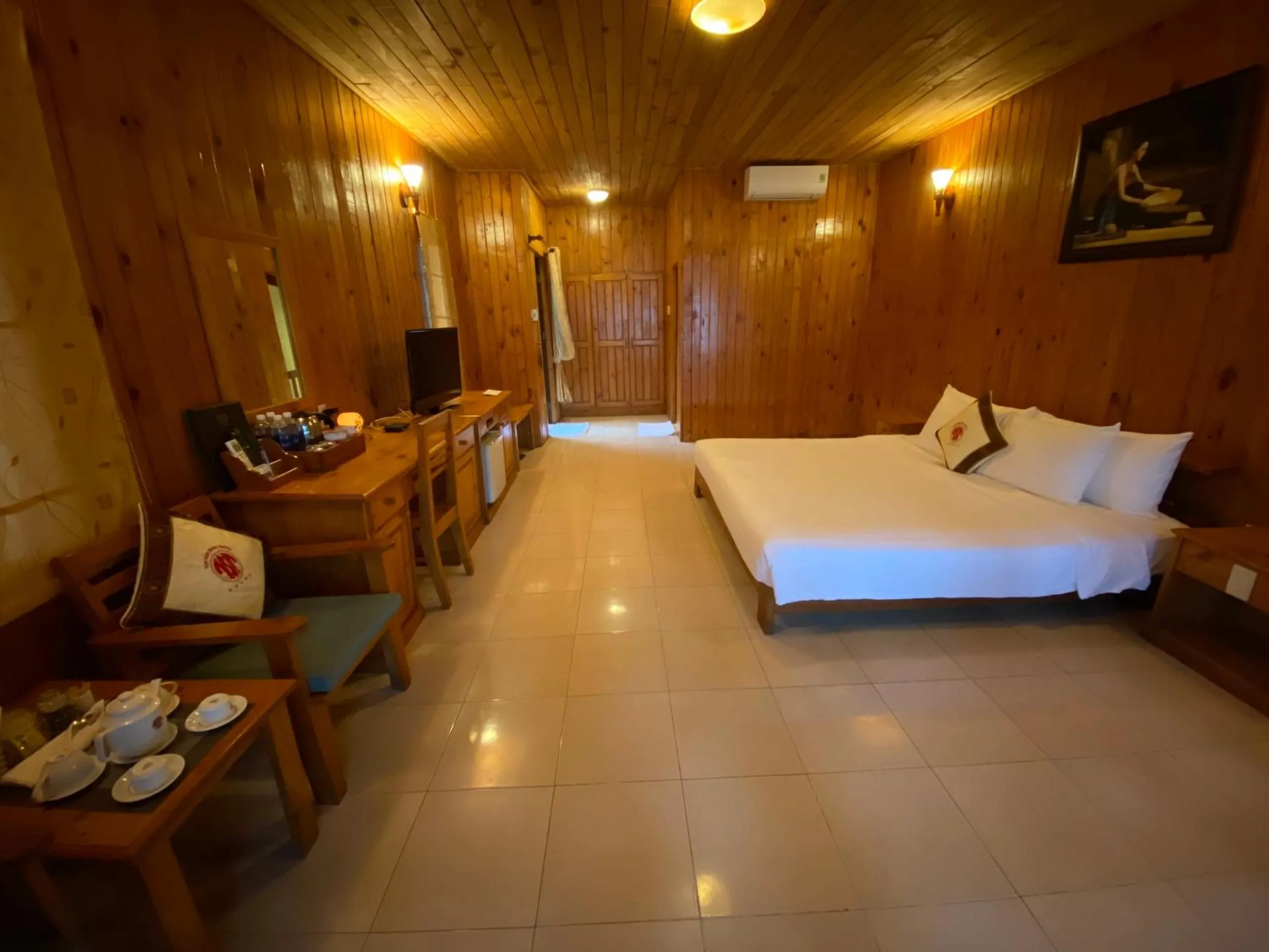 Photo of the whole room, Bed in Tan Son Nhat Con Dao Resort