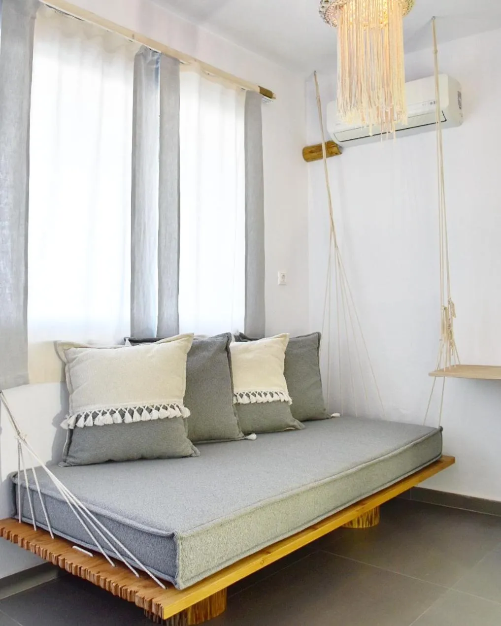 Living room, Bed in Angelos Design Suites