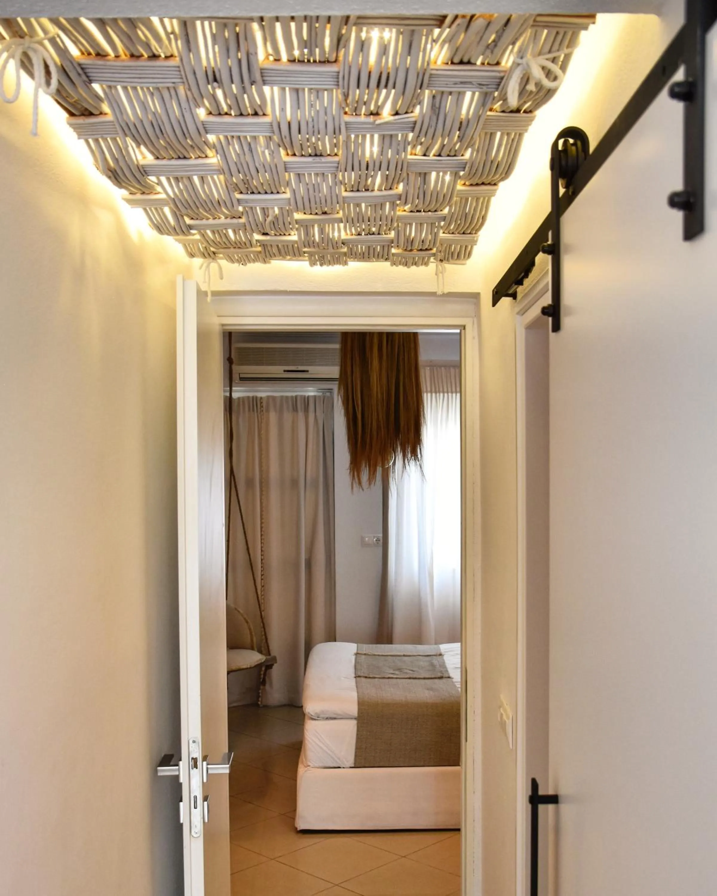 Photo of the whole room, Bed in Angelos Design Suites