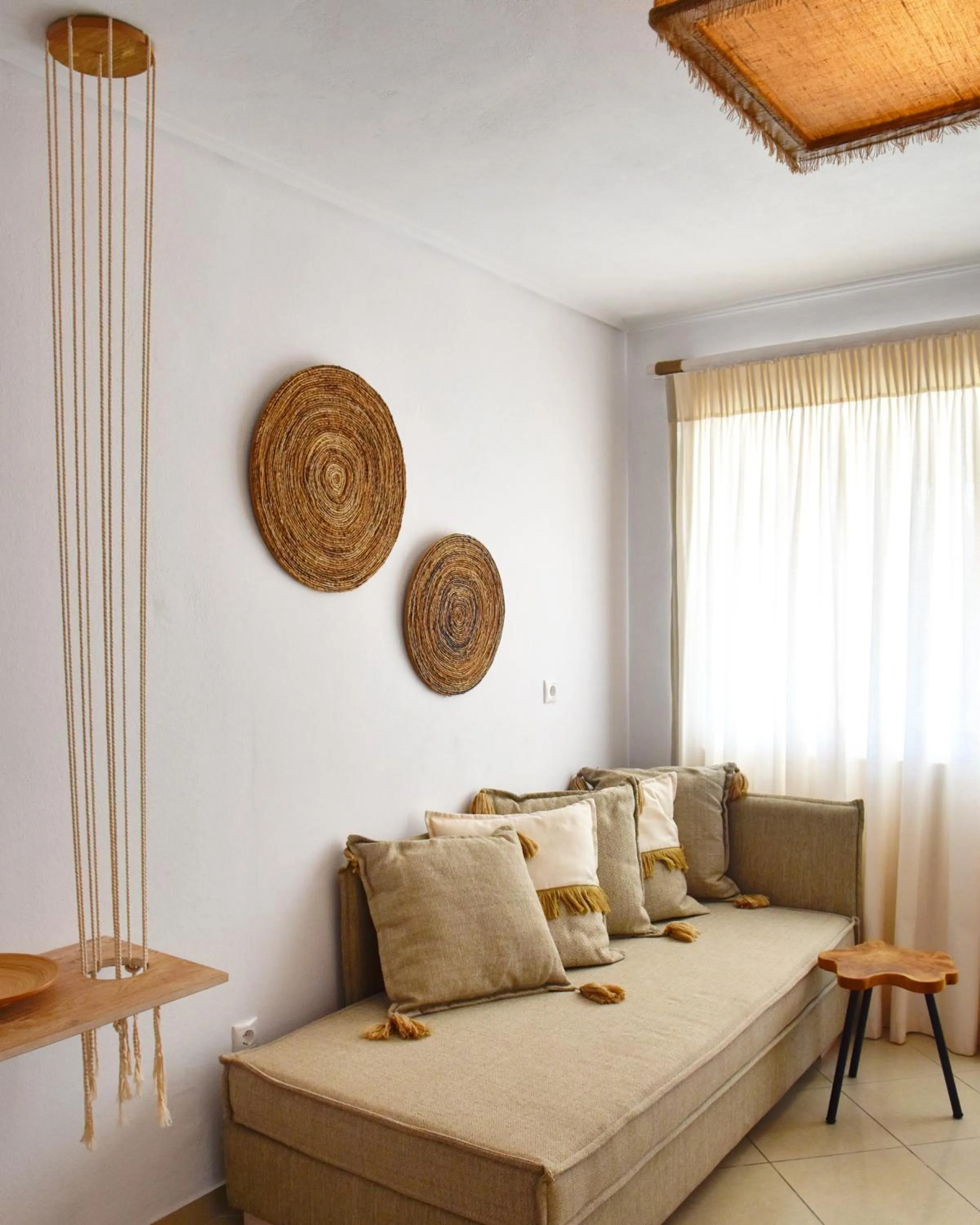 Living room, Bed in Angelos Design Suites