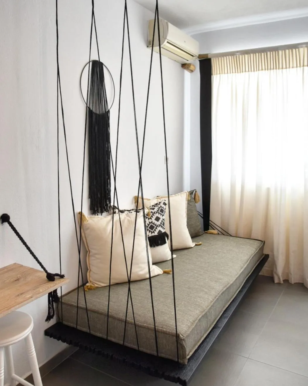 Living room, Bed in Angelos Design Suites