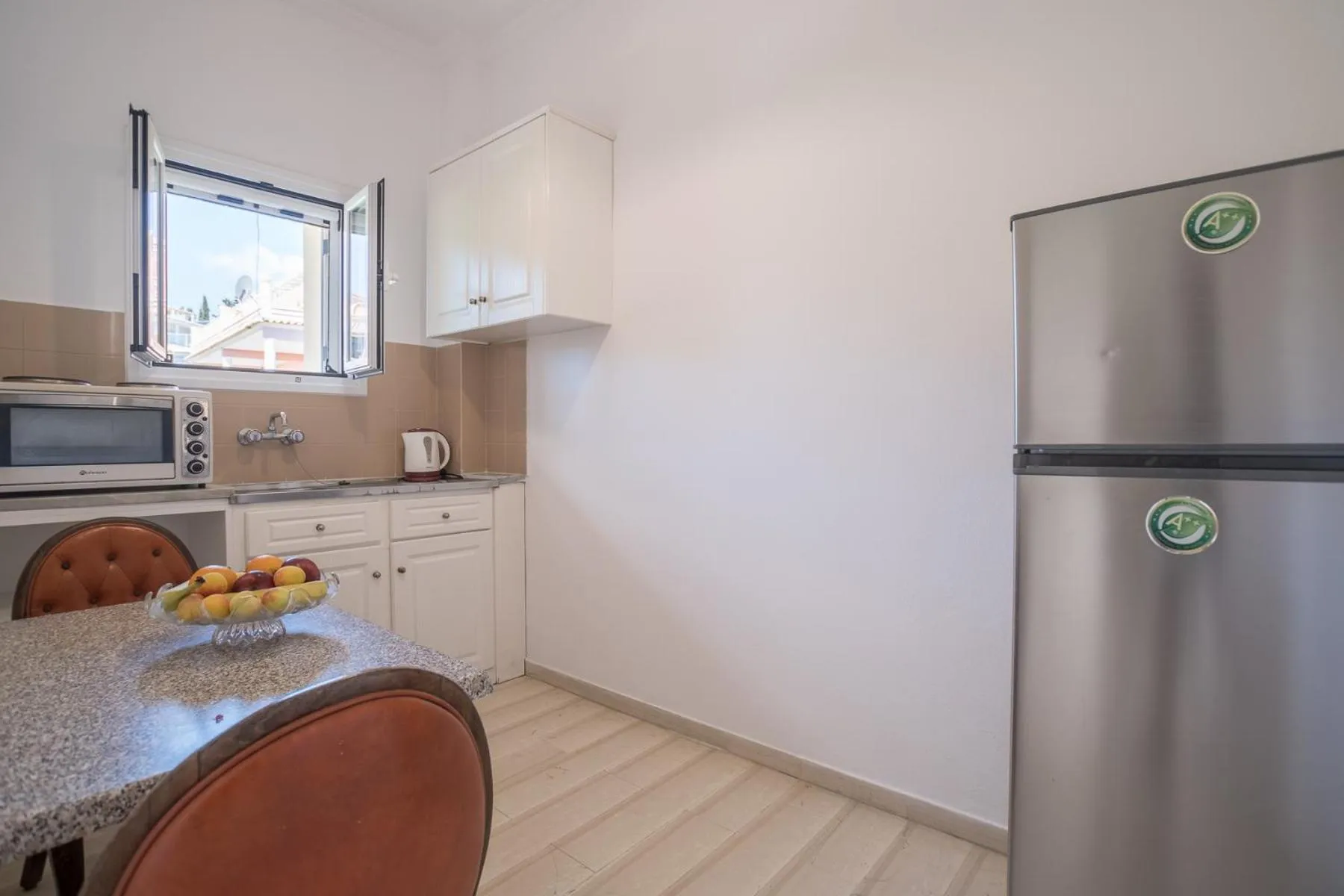 Kitchen or kitchenette in Dimitra Apartments G