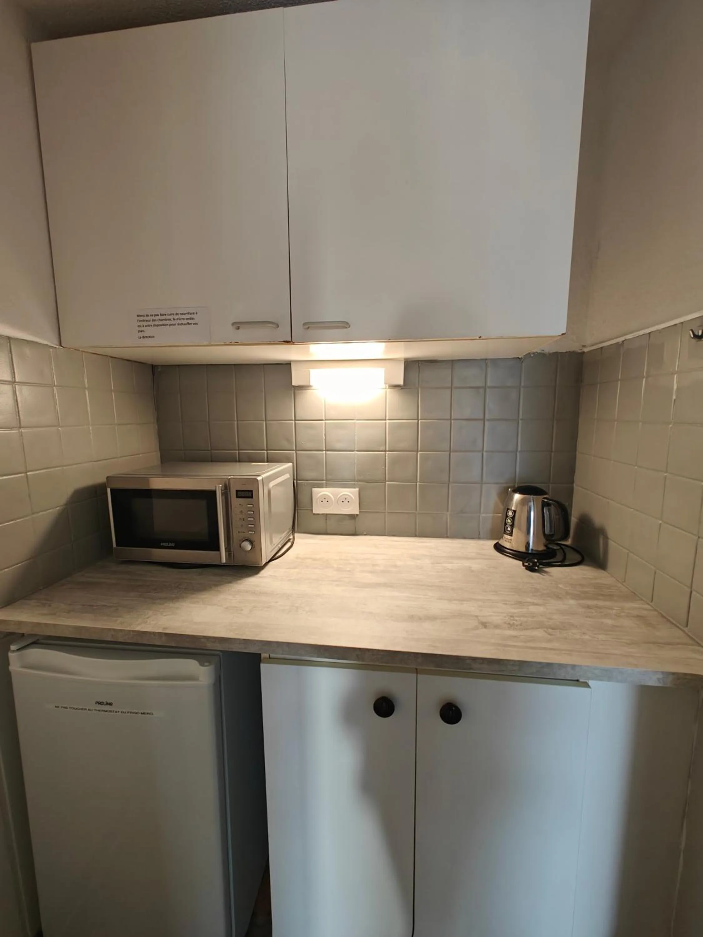 Kitchen or kitchenette in Auberge Des Pins