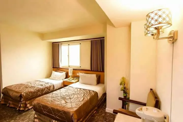Bed in Lo Fo Hotel