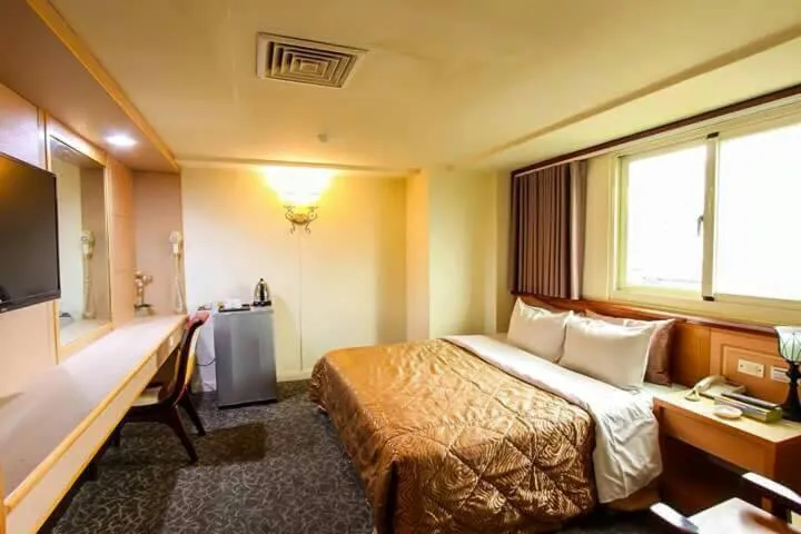 Bed in Lo Fo Hotel