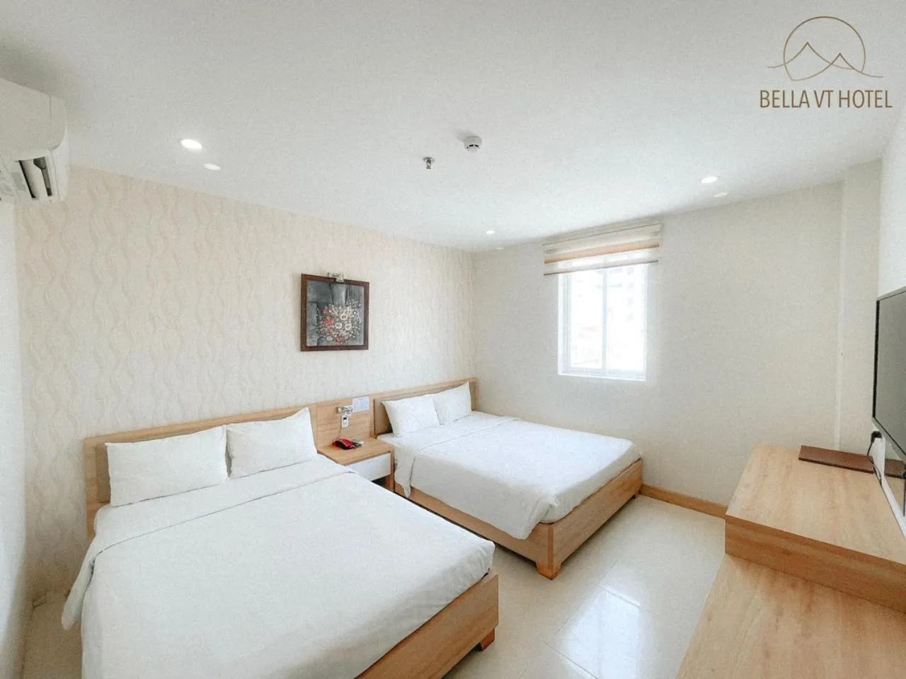 Bed in BELLA VT HOTEL