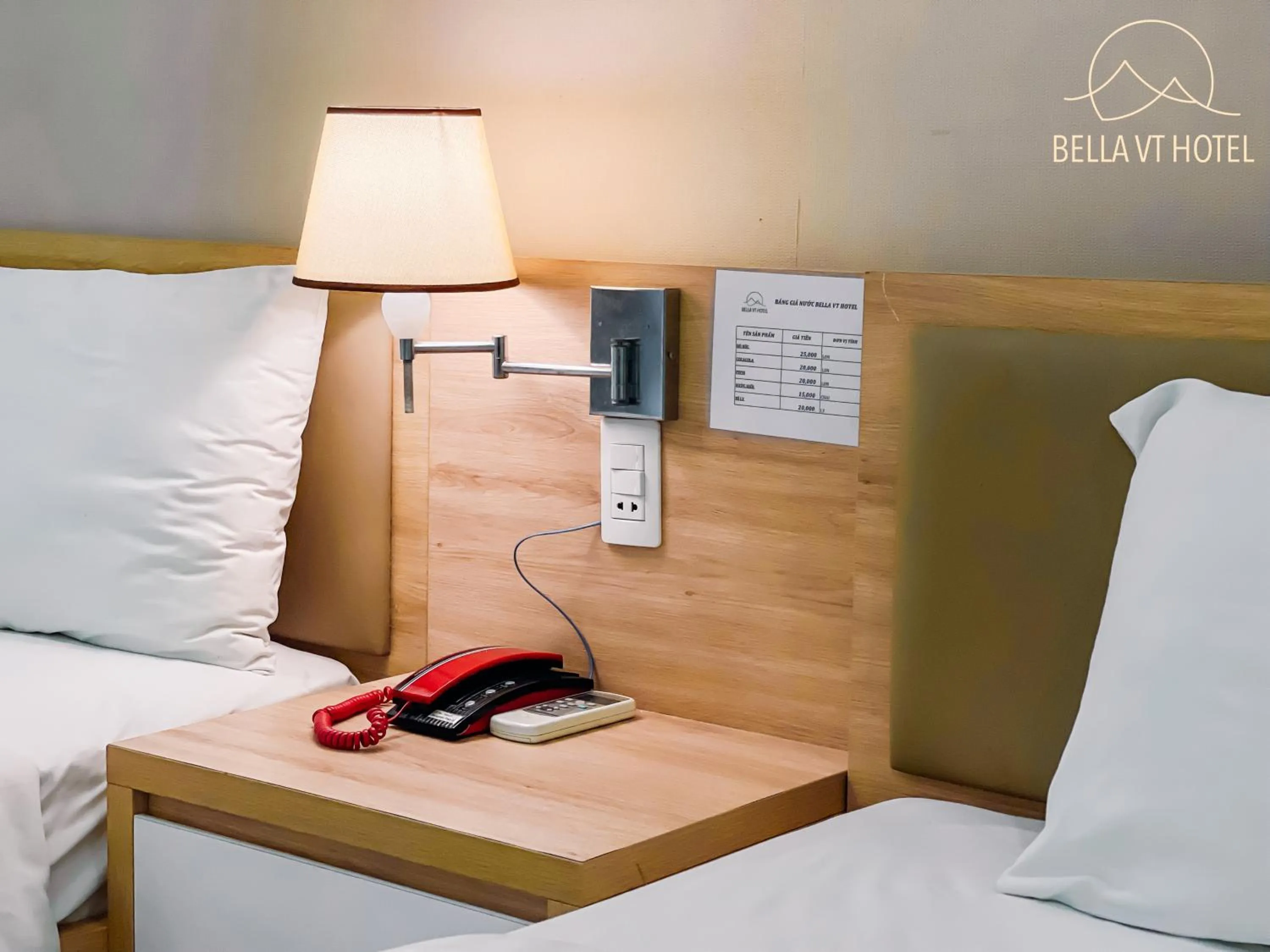 Bed in BELLA VT HOTEL