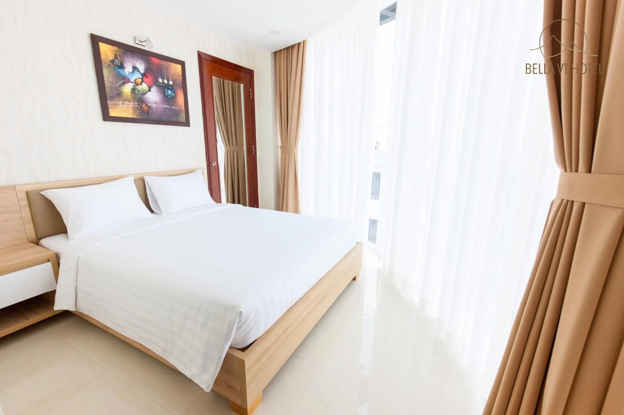 Bed in BELLA VT HOTEL