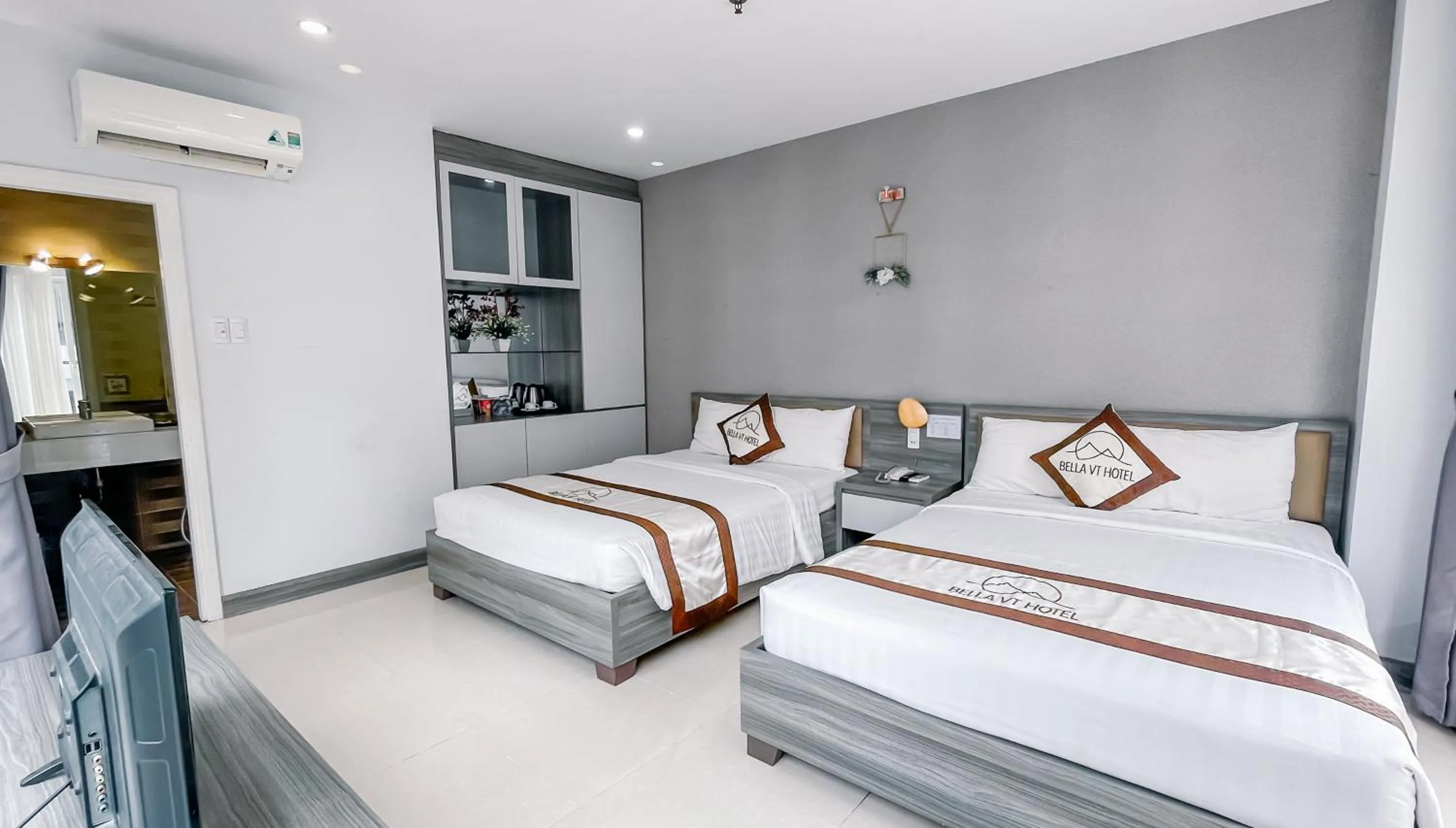 Bed in BELLA VT HOTEL