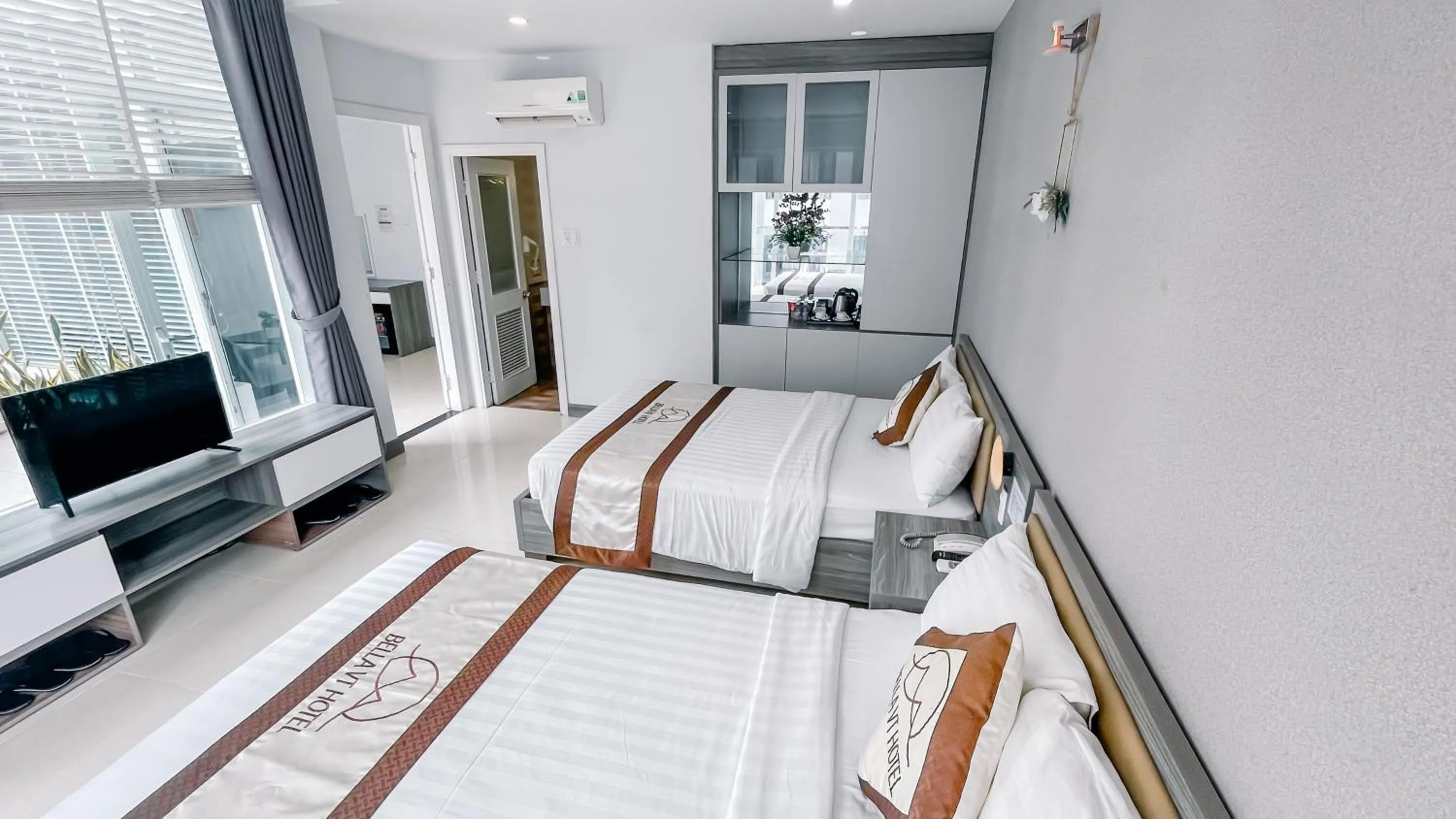 Bed in BELLA VT HOTEL