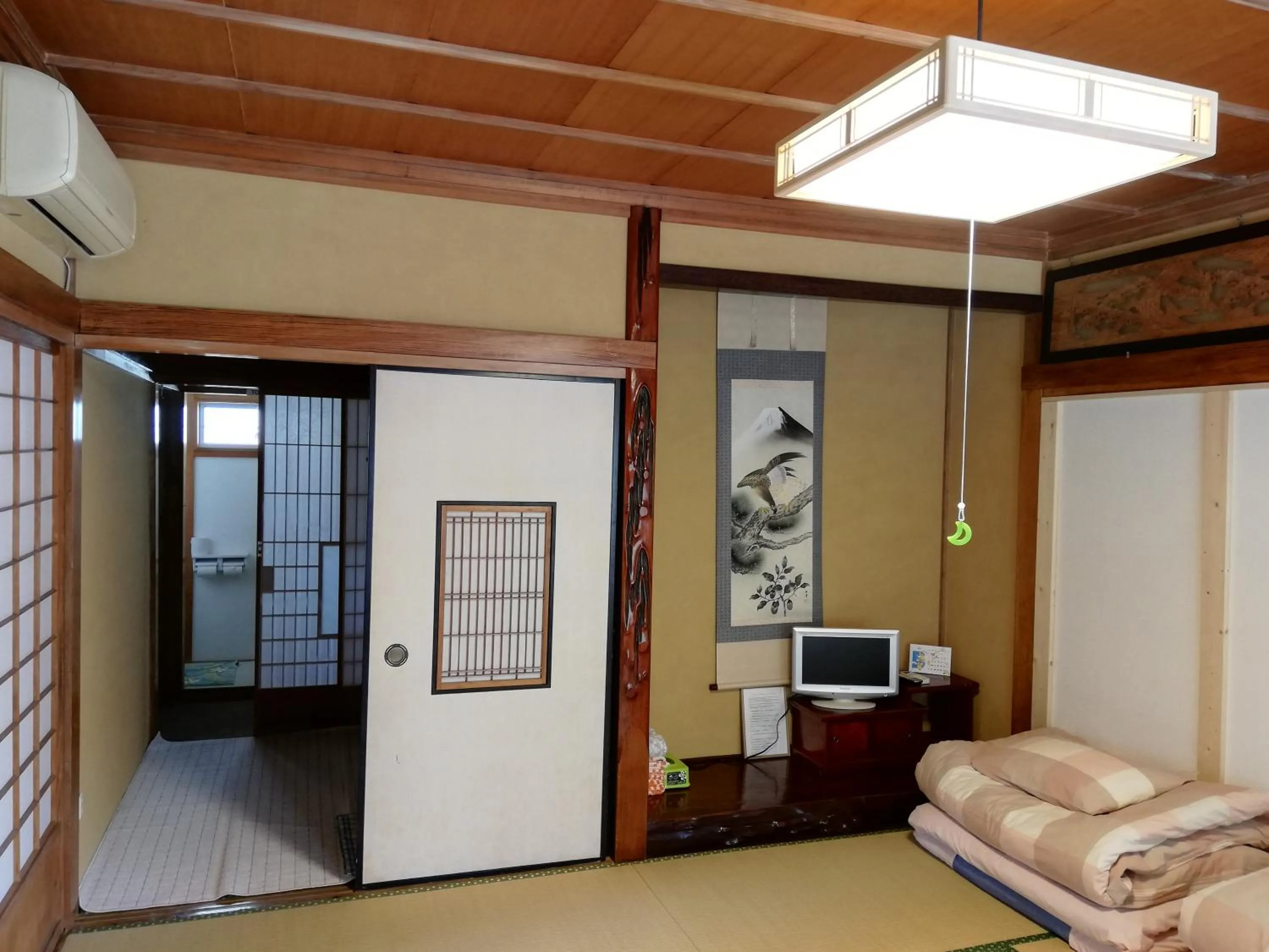 Bed in Izu Hokkawa Seaside Guesthouse 伊豆北川の家