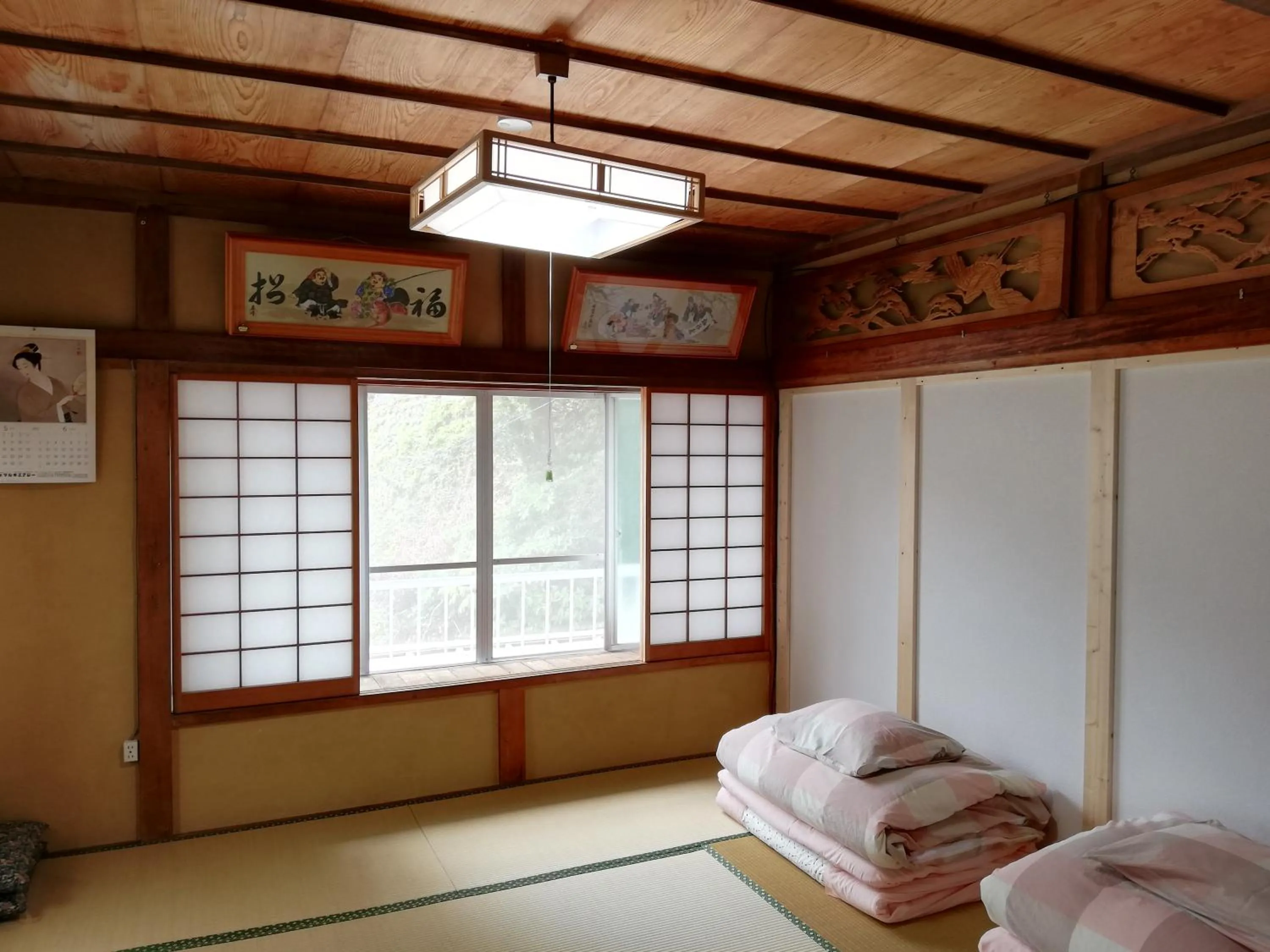 Bed in Izu Hokkawa Seaside Guesthouse 伊豆北川の家