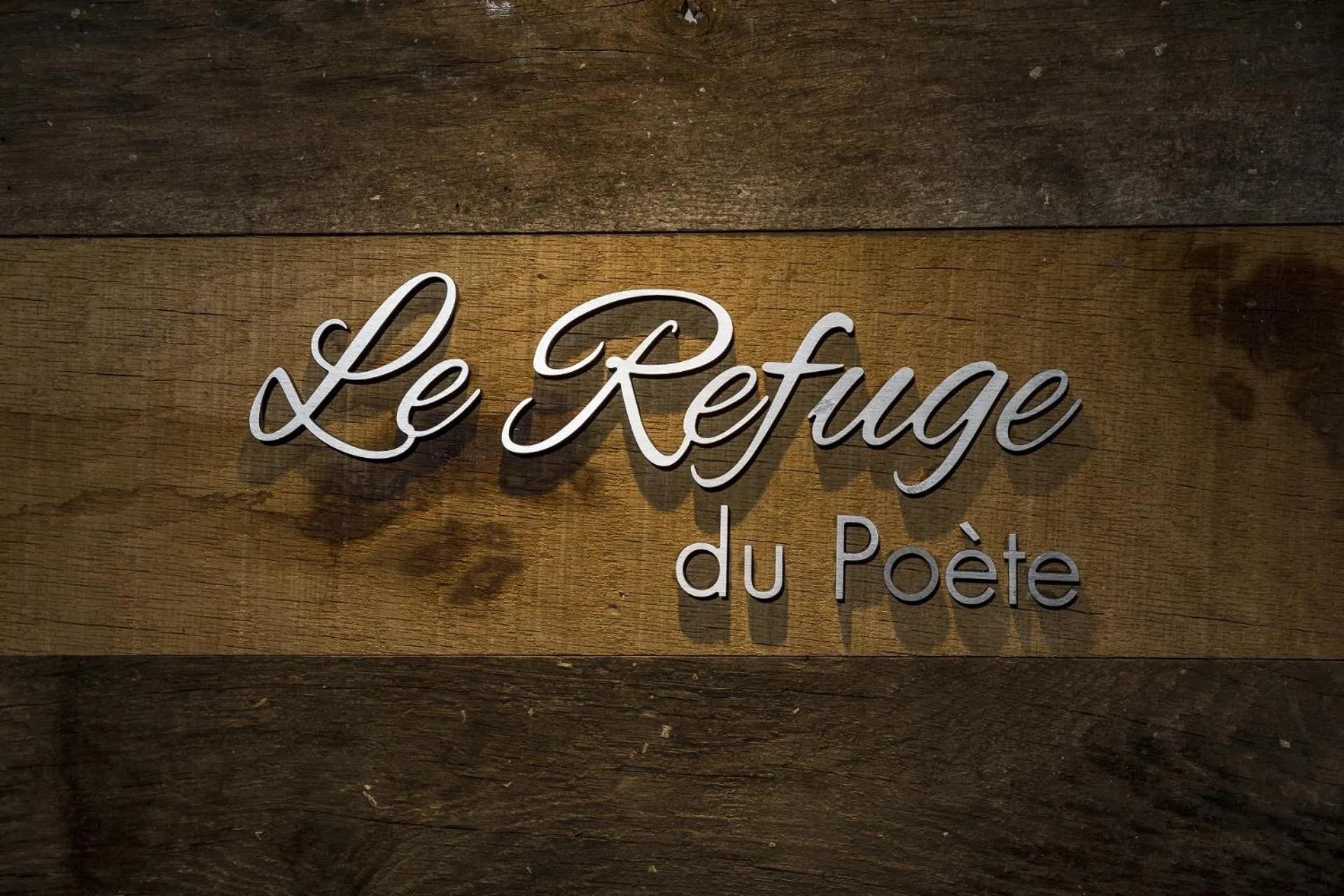 Property logo or sign in Auberge au Boeuf