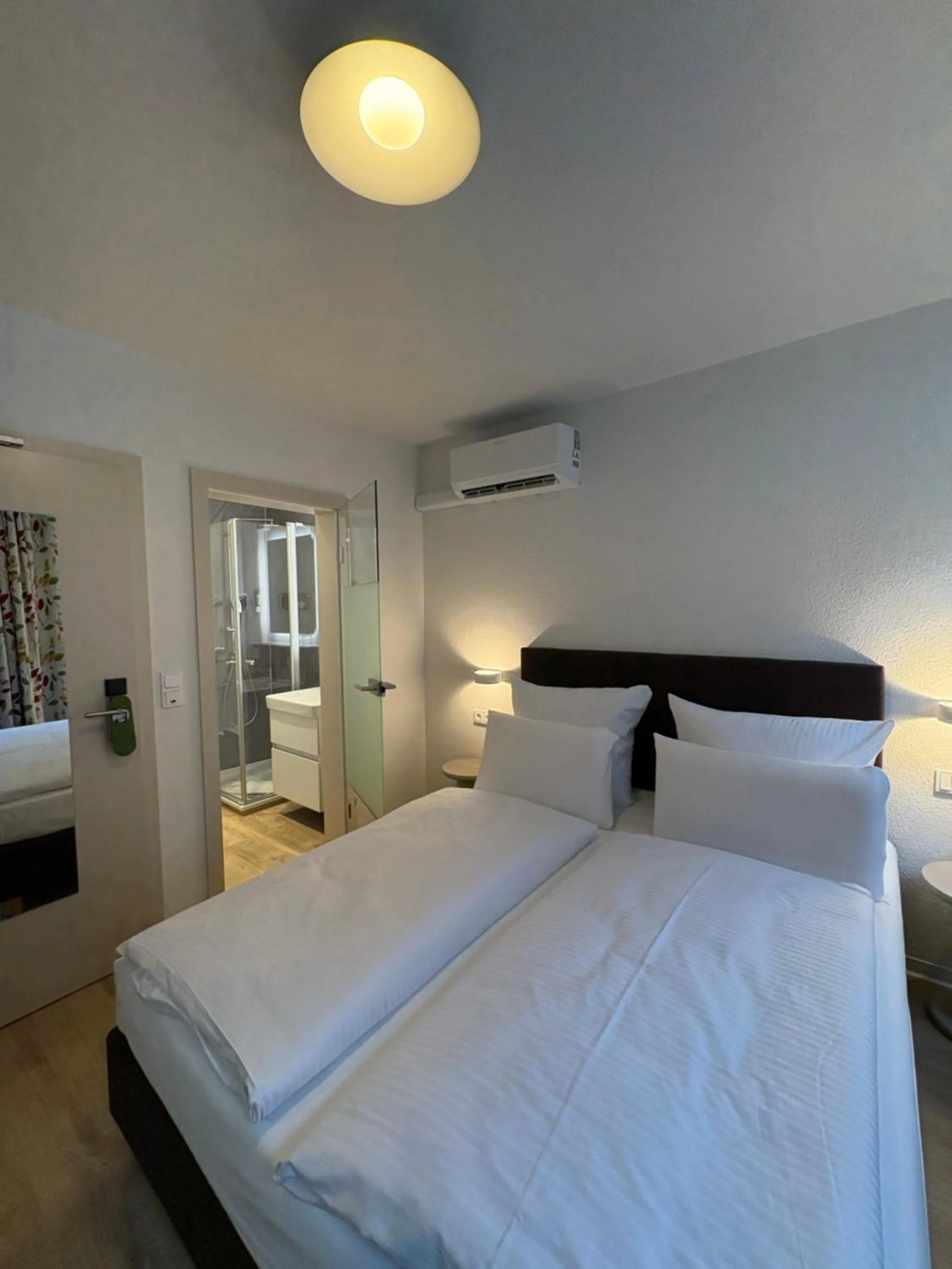 Bed in Das Mühlentor Hotel