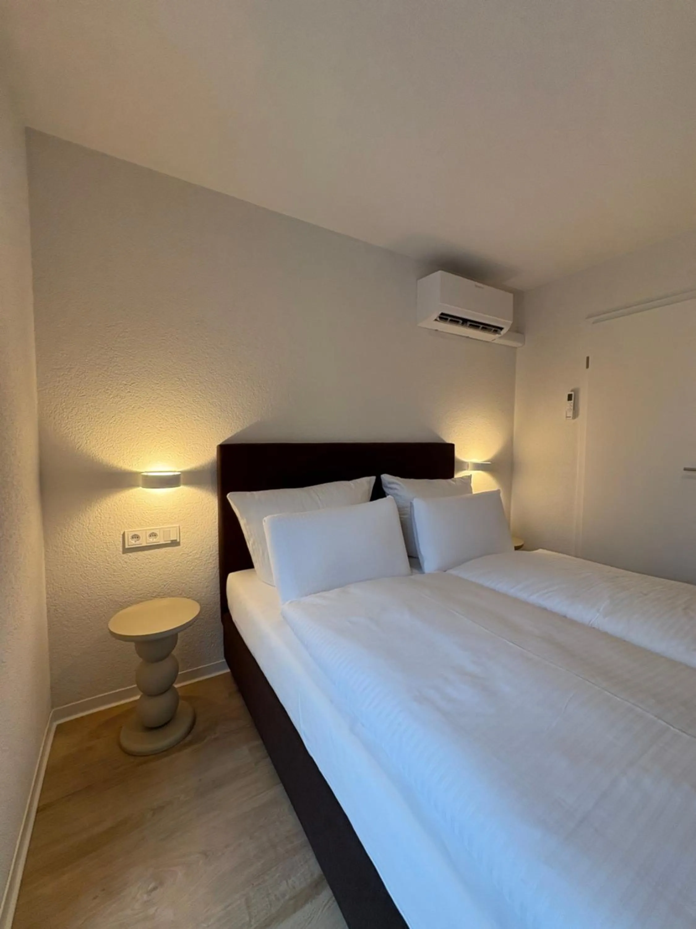 Bed in Das Mühlentor Hotel