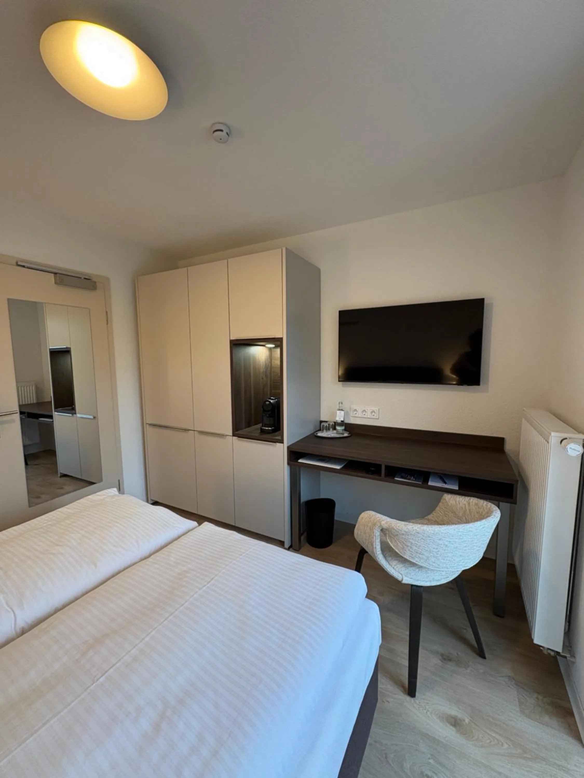 Bed in Das Mühlentor Hotel