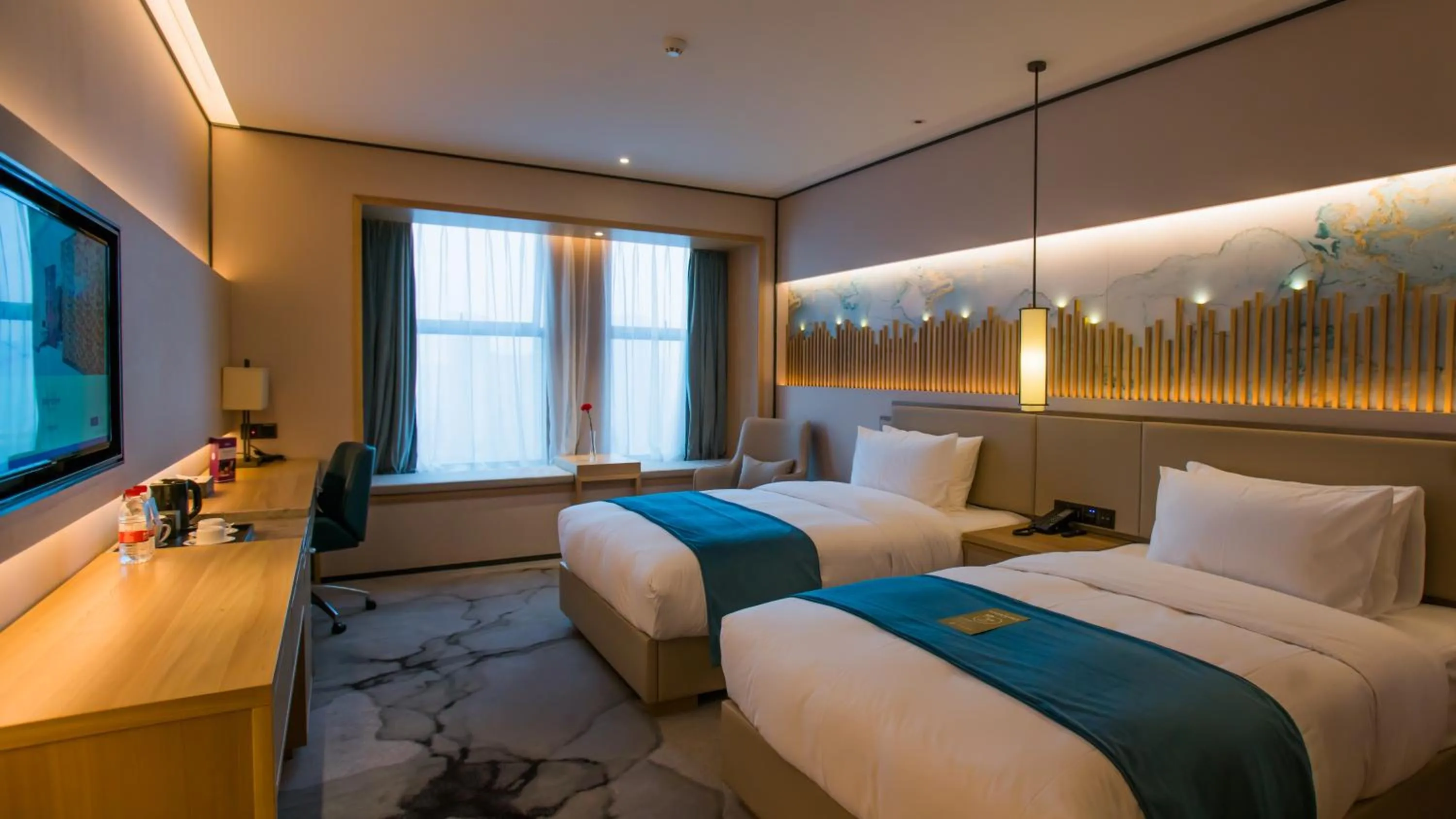 Bed in Mercure Chengdu Huapaifang