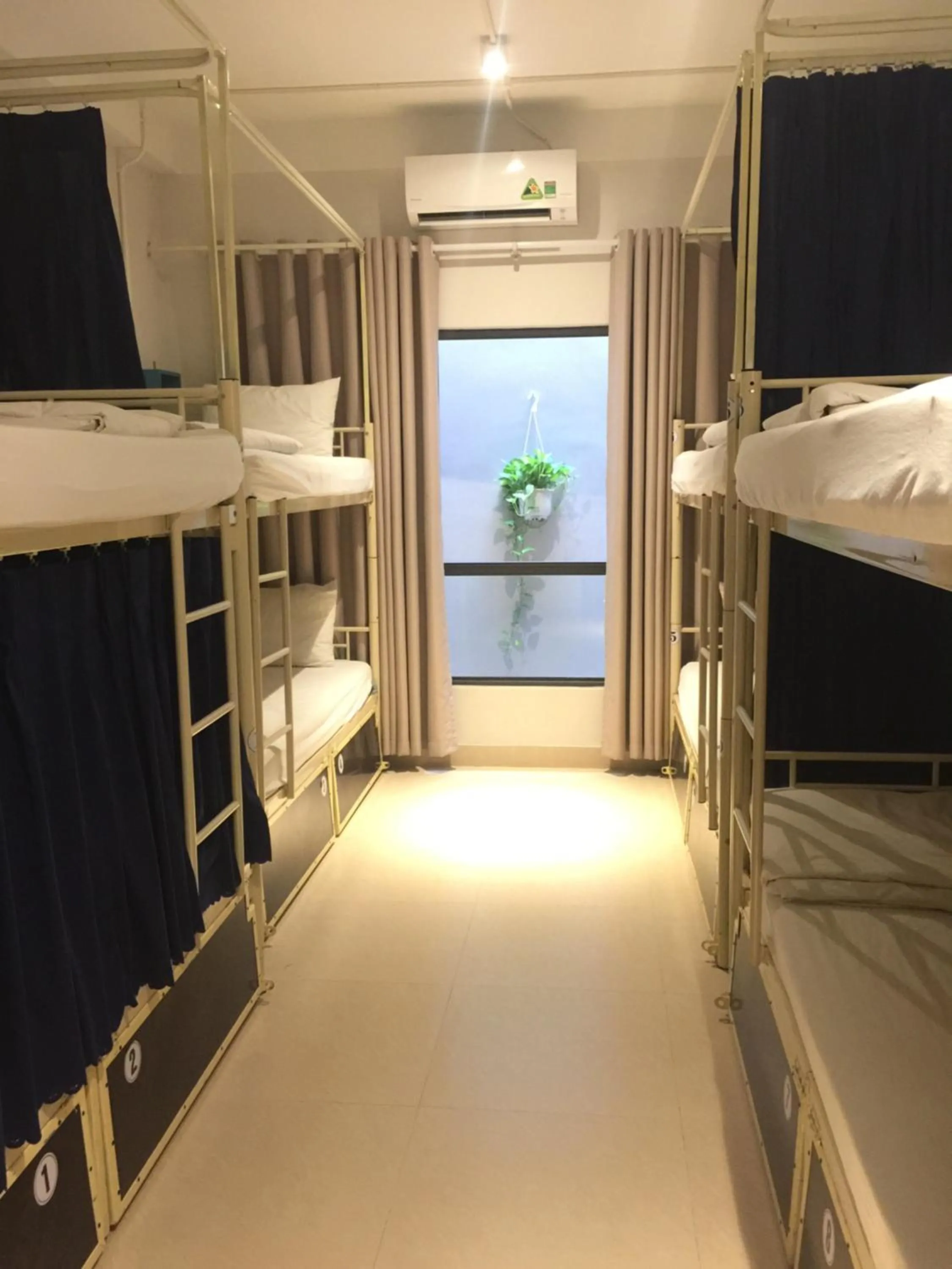 air conditioner, Bed in Backhome Hostel & Bar