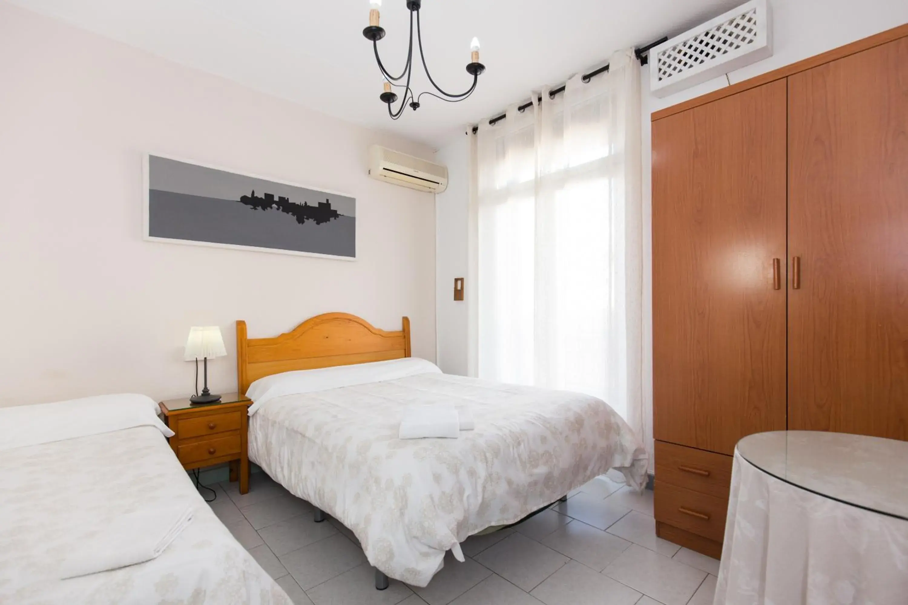 Triple Room with Private Exterior Bathroom in Pension Mesones Triple Room with Private Exterior Bathroom in Pension Mesones