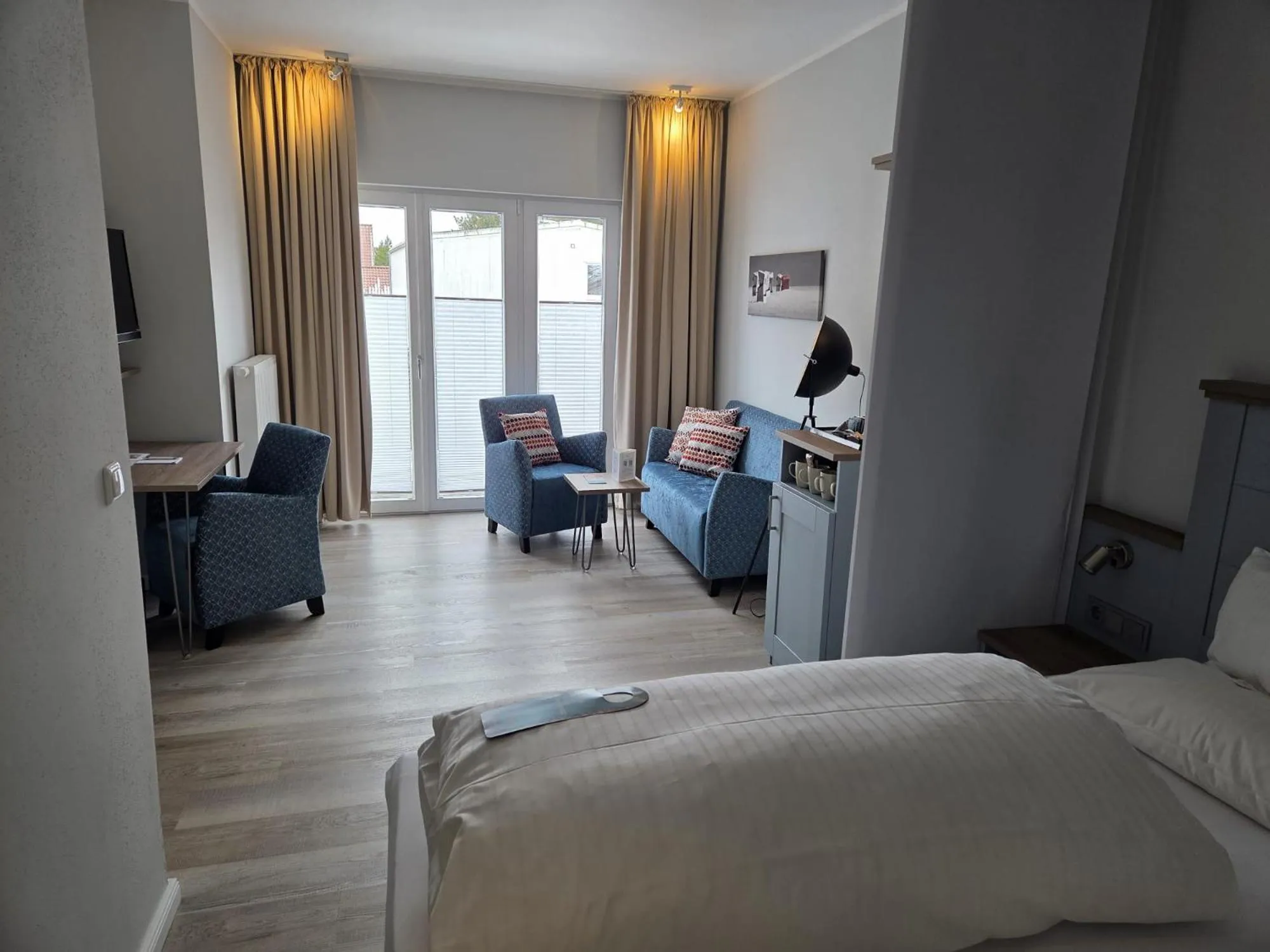 Seating area, Bed in Boutiquehotel Myn Utspann