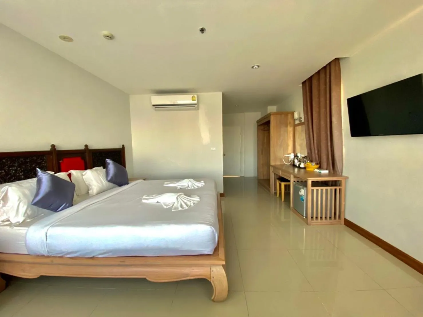 Bed in At Ruam Chok Hotel