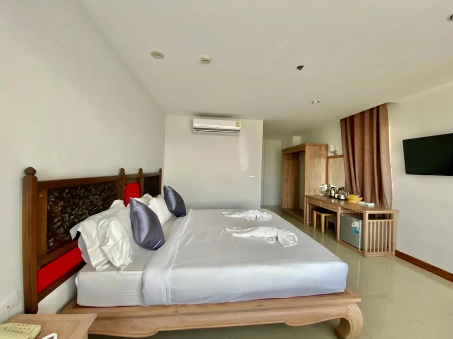 Bed in At Ruam Chok Hotel