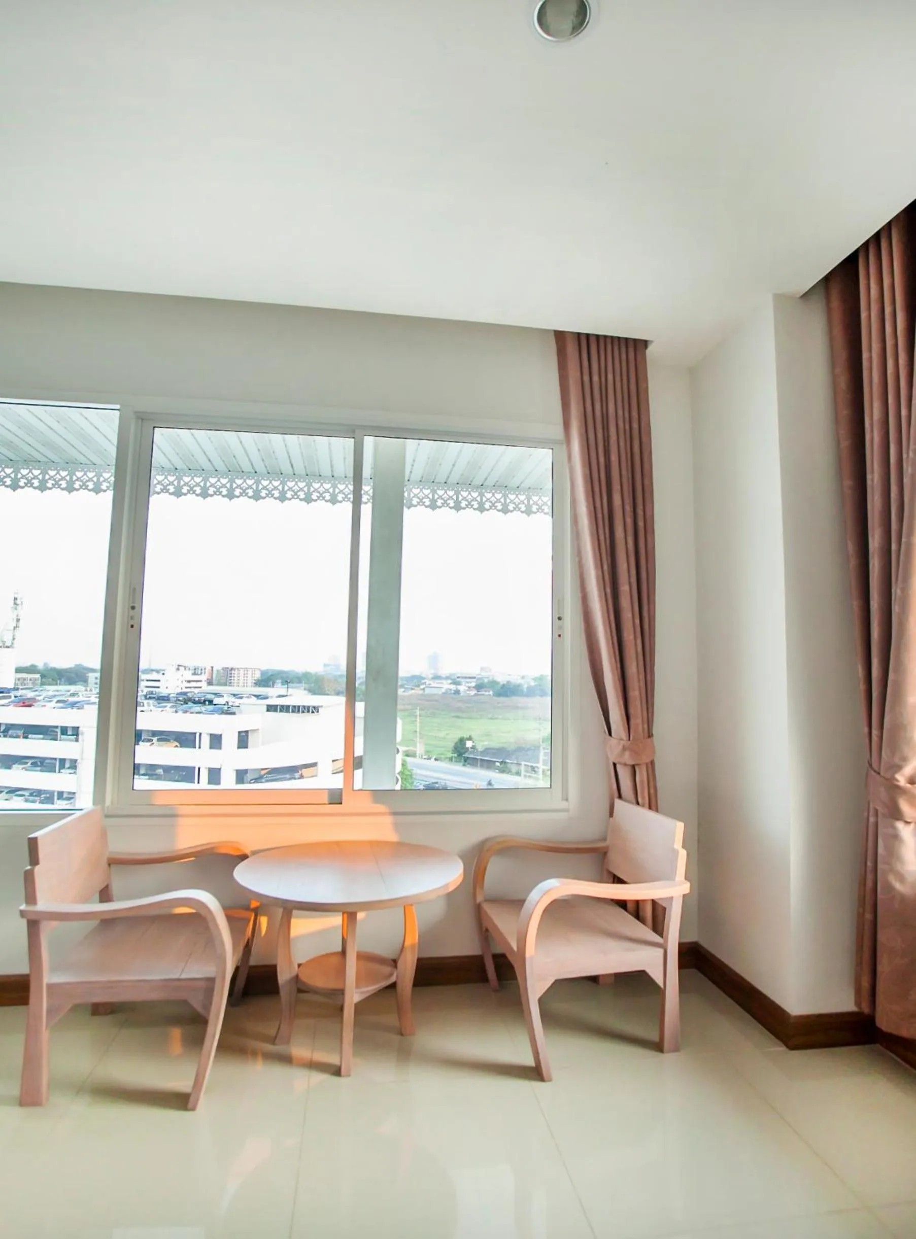 Seating area in At Ruam Chok Hotel