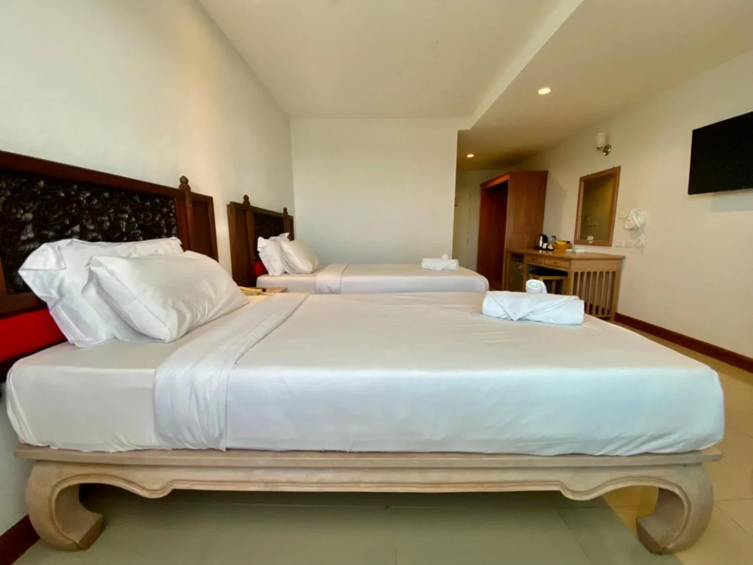 Bed in At Ruam Chok Hotel